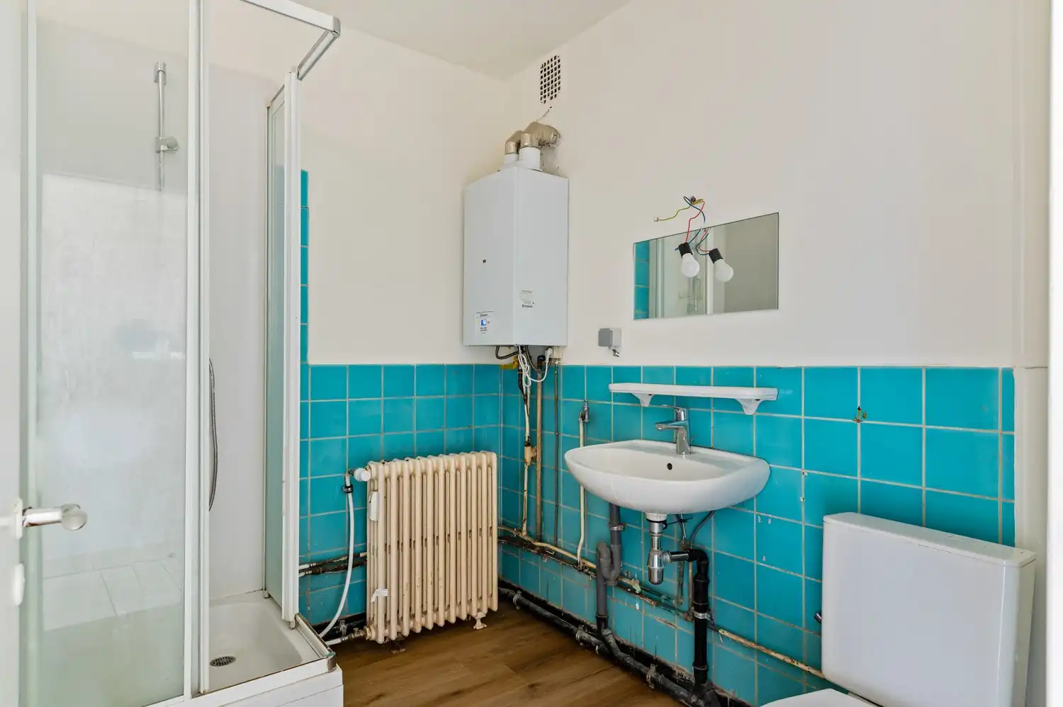Licht op te frissen appartement met ruime living van 40 m² en nieuwe keuken foto 8