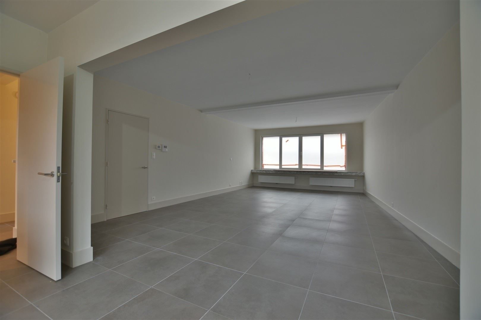 Totaal gerenoveerd GV appartement met tuin te Grembergen foto 14