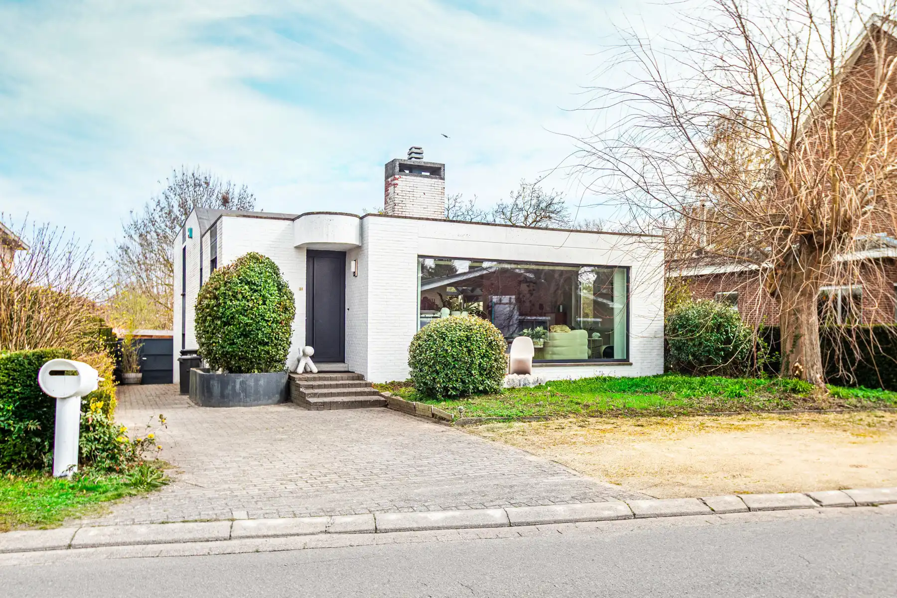 Hoofdfoto van de publicatie: Vrijstaande woning op 1.460 m² in het groen te Heffen