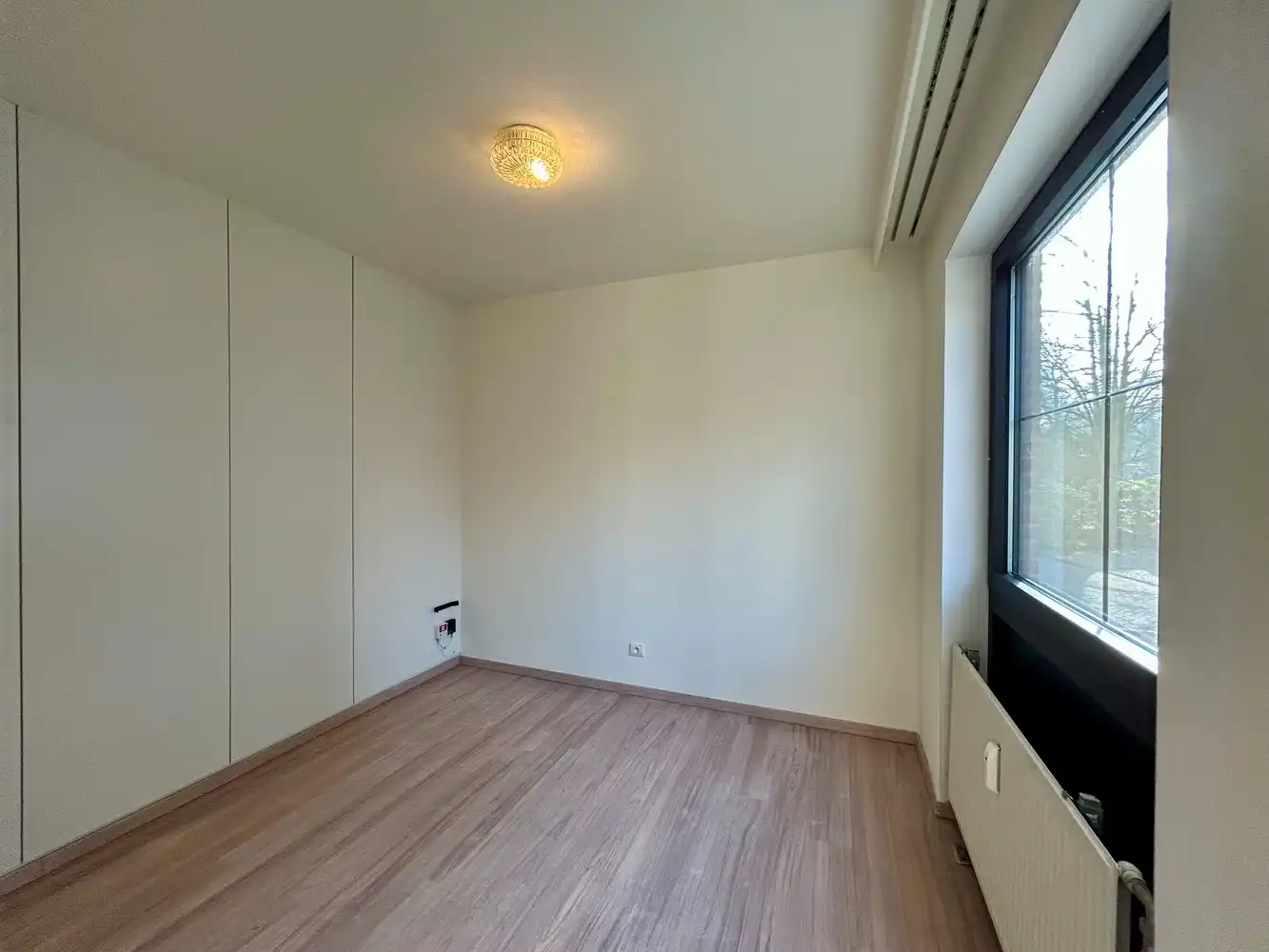 Gelijkvloerse flat met autostaanplaats op topligging binnen de Leuvense ring foto 8