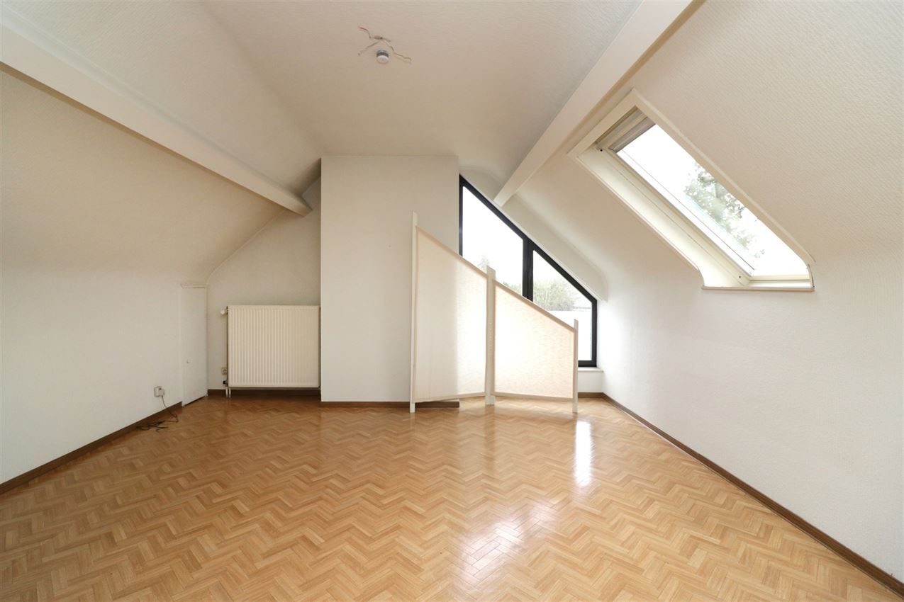 Centraal gelegen appartement met 3 slpk., garage en terras foto 5