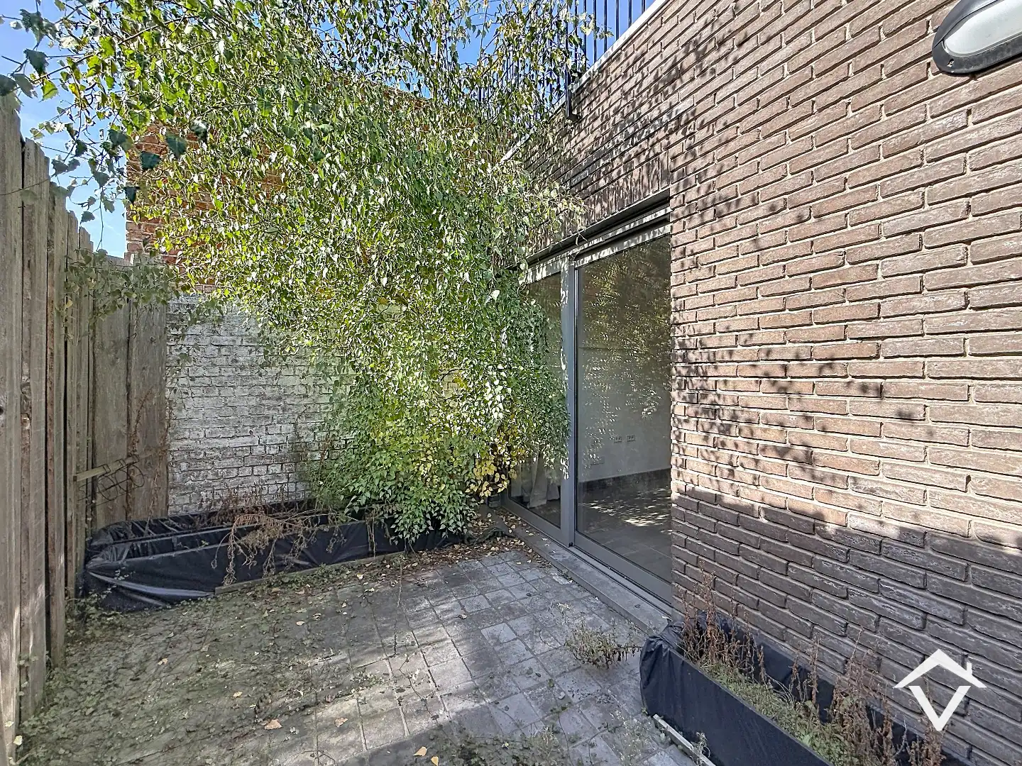 Ruime woning bestaande uit twee entiteiten met 4 slaapkamers en terras in centrum Tielt foto 12