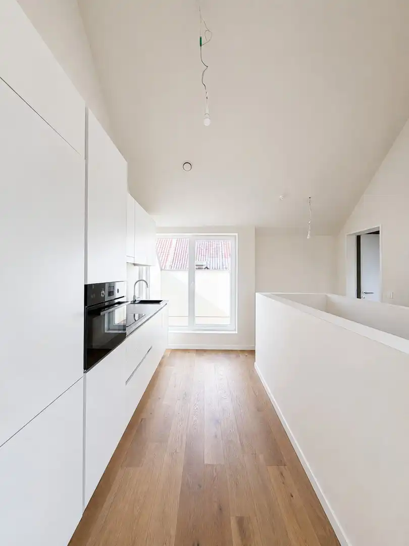 Instapklaar nieuwbouwappartement met 2 terrassen foto 3