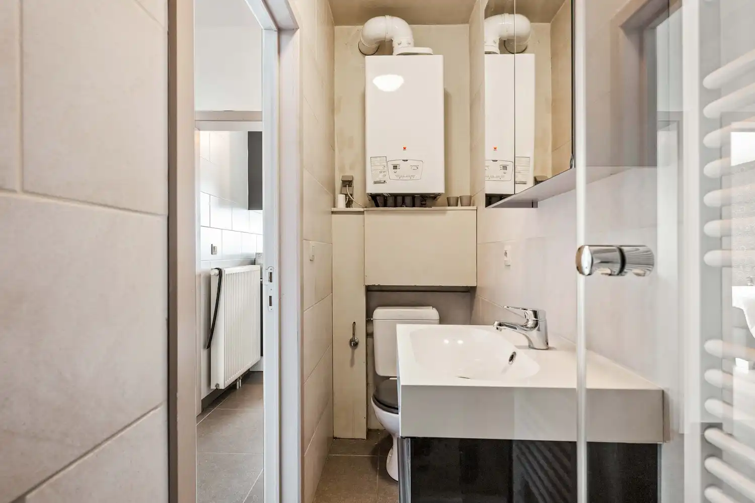 Instapklaar gelijkvloers appartement met zonnige tuin foto 14