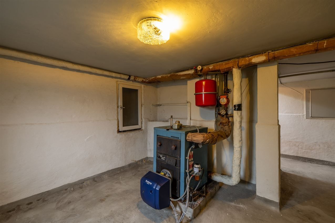 Te renoveren woning met 4 slk. in het hart van Averbode foto 29