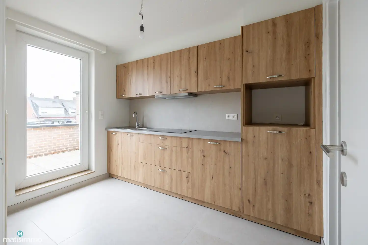 INSTAPKLAAR APPARTEMENT MET 2 SLAAPKAMERS EN GARAGE NABIJ HET CENTRUM VAN BILZEN foto 5