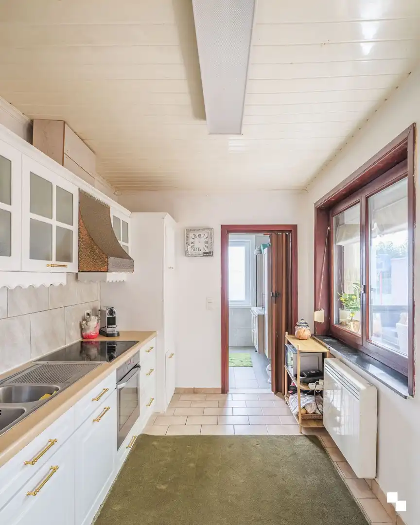 Op te frissen woning te koop aan het station van Melle foto 7