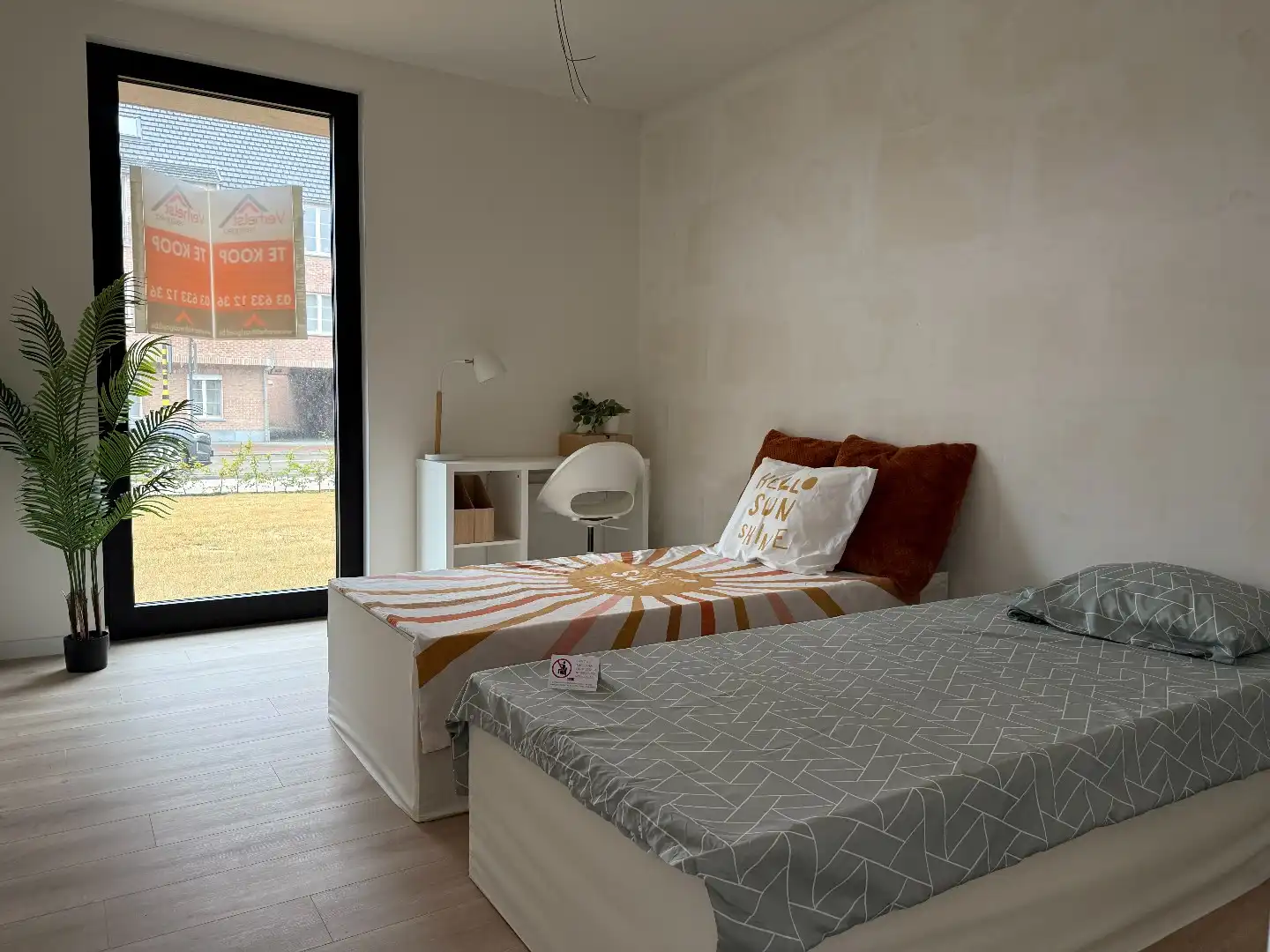 Laatste gelijkvloers 2-slpk appartement met tuin, 1 stpls en een kelder foto 10