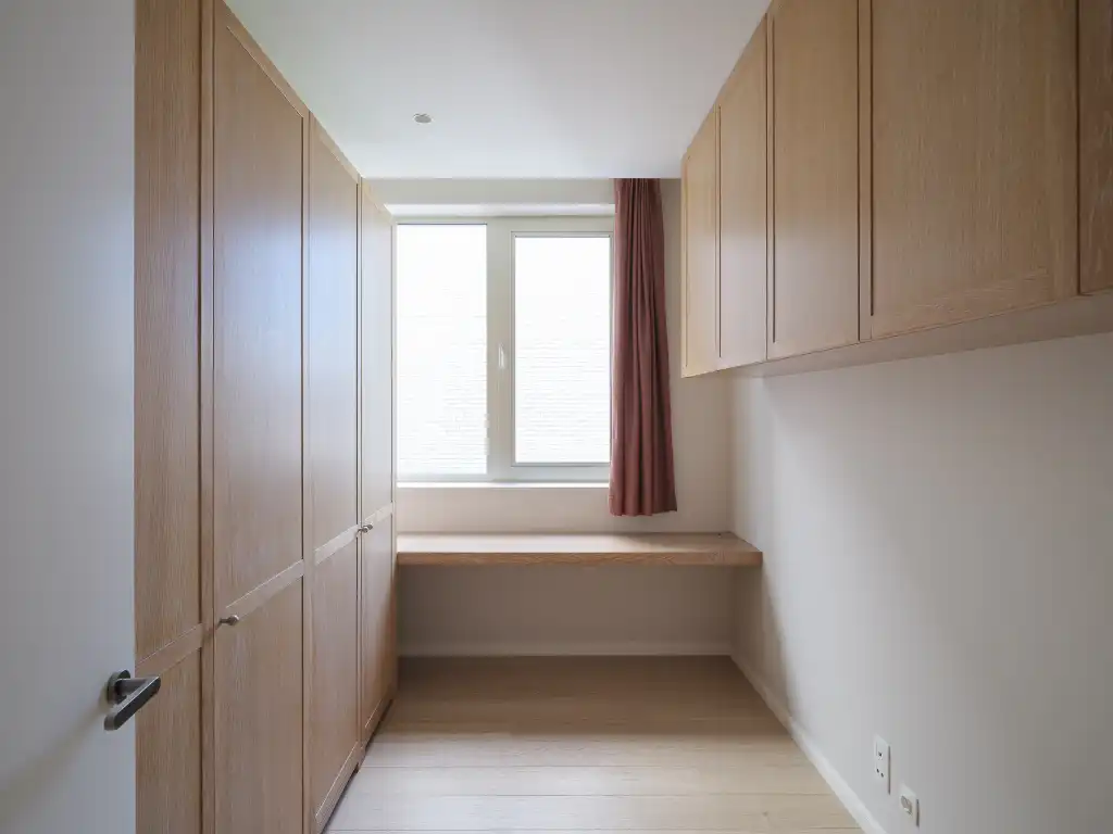 Luxueus tweeslaapkamerappartement met ruim terras en centrale ligging aan de Kouter. foto 11