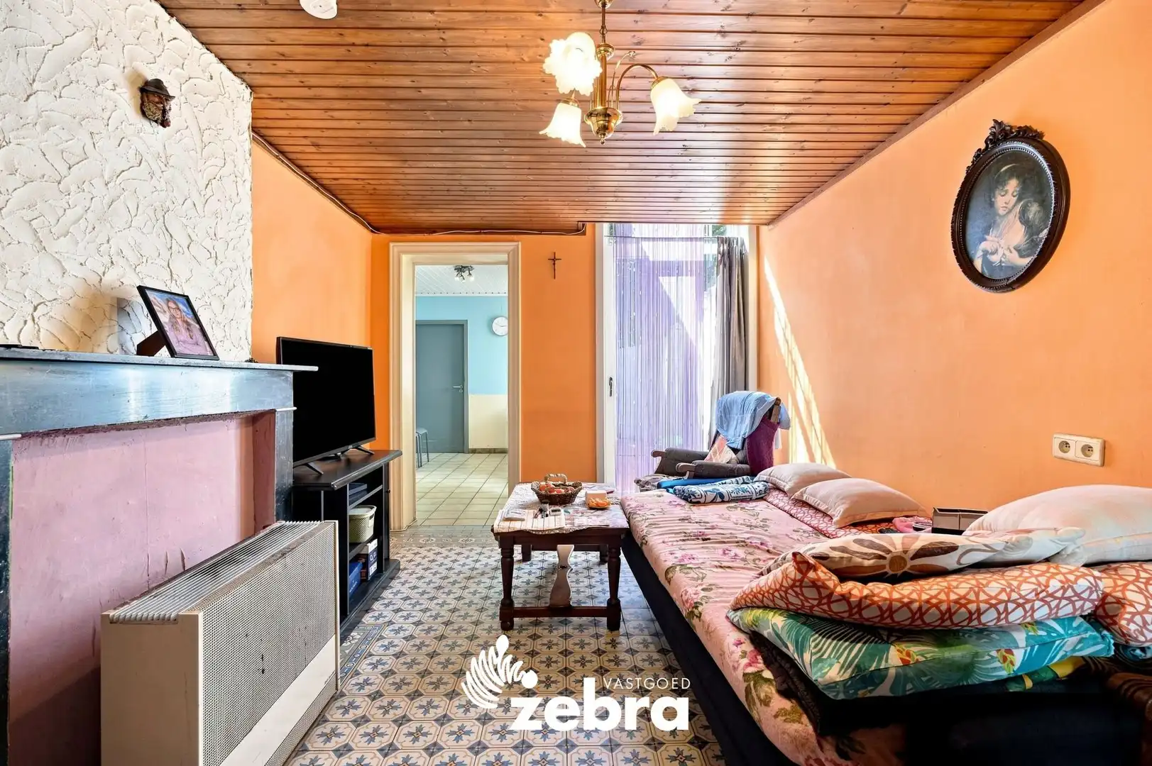 Te renoveren woning met 3 slaapkamers, kelder en zuidwestgerichte stadskoer in Tielt! foto 5