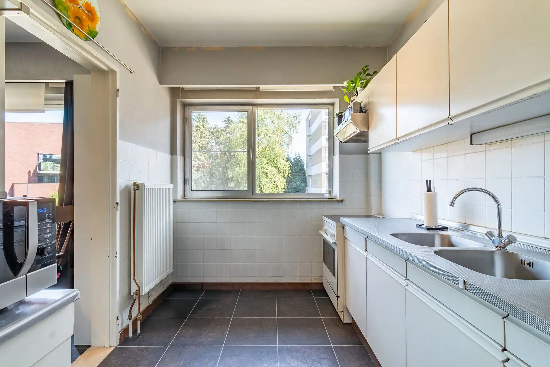 Praktisch appartement met garagebox en twee terrassen foto 6