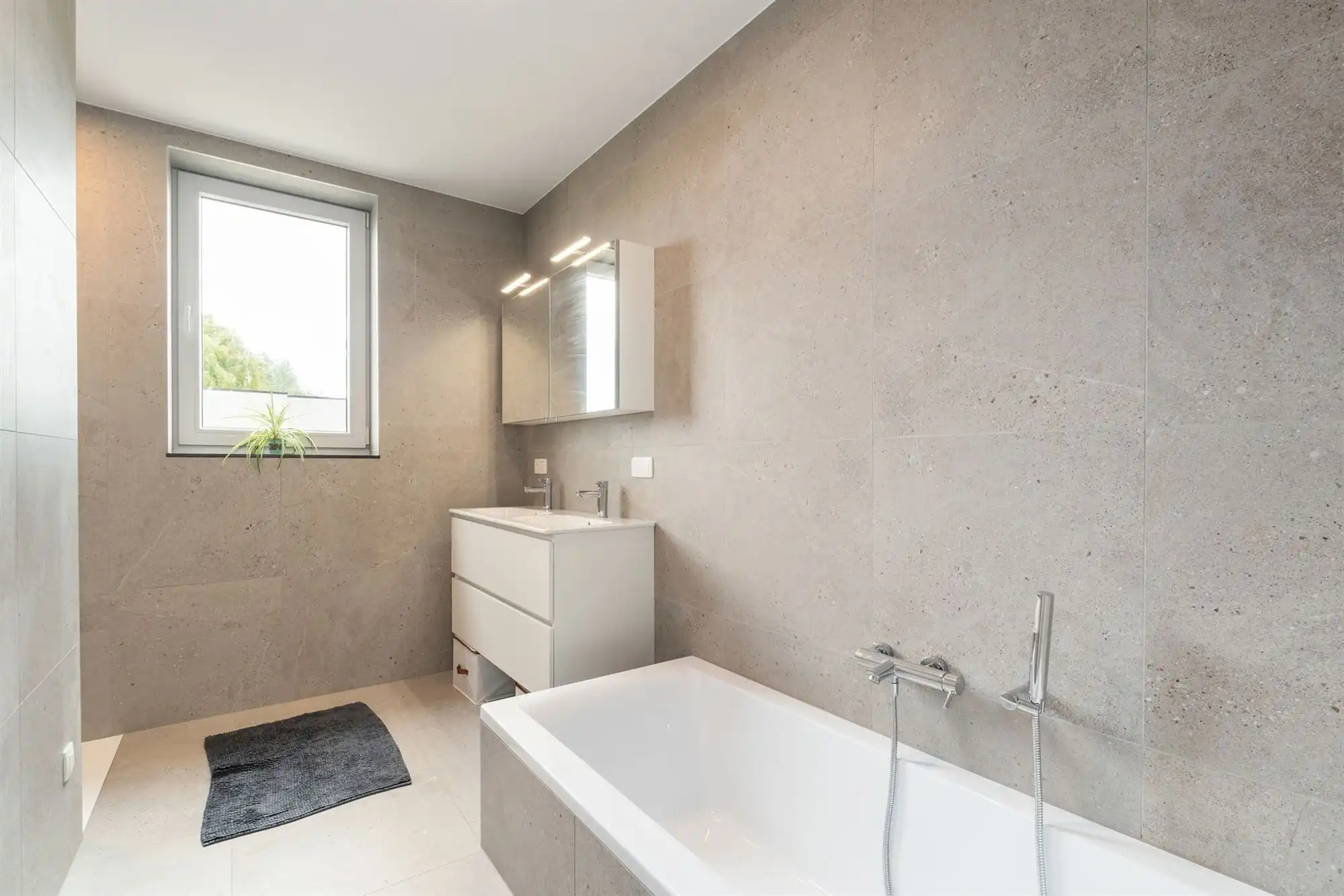 Instapklare nieuwbouwwoning met 3 slaapkamers, carport en zonnige tuin foto 9