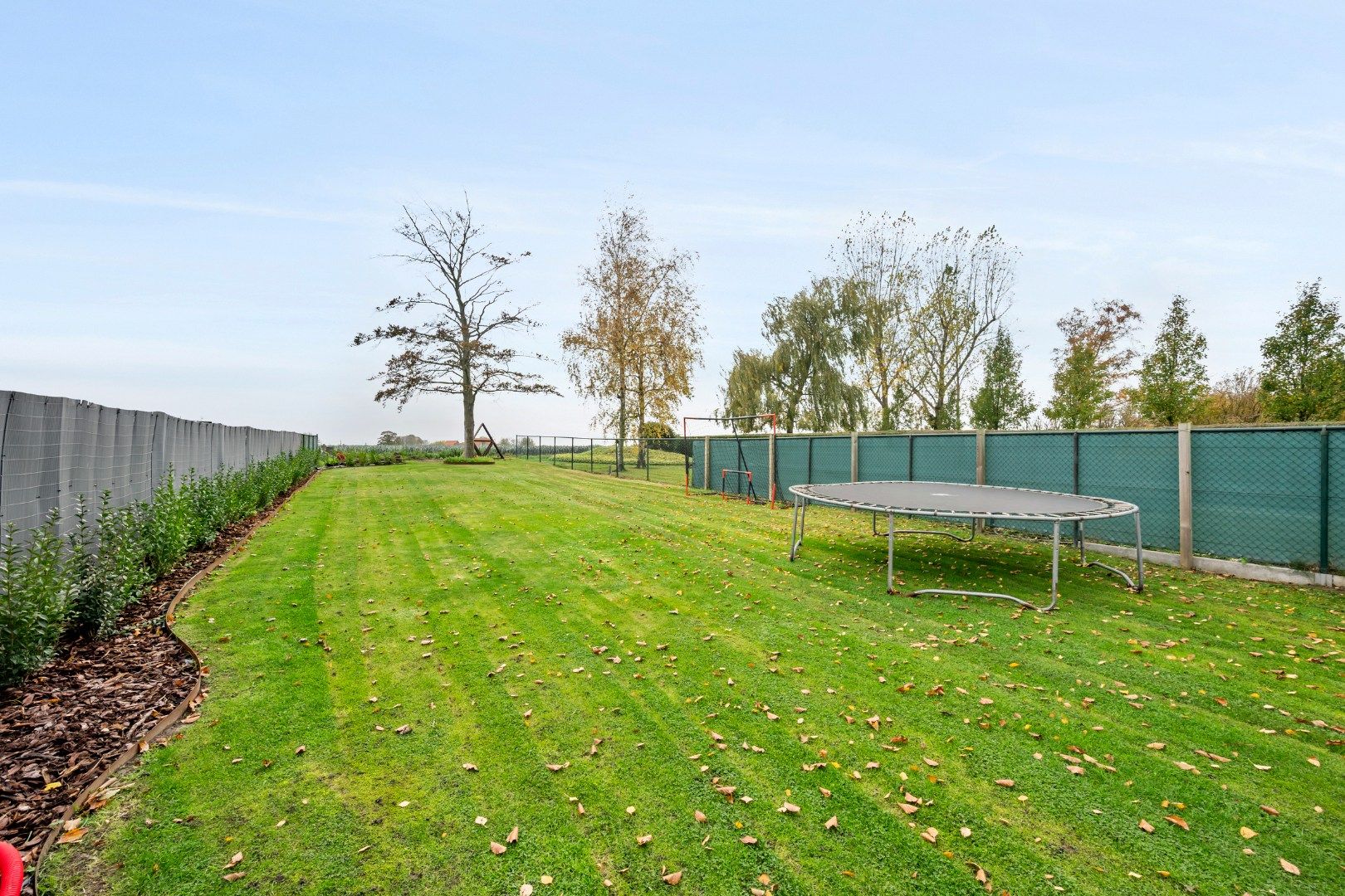Instapklare halfopen woning met 4 slaapkamers, garage en zonnige tuin in Moorslede foto 6