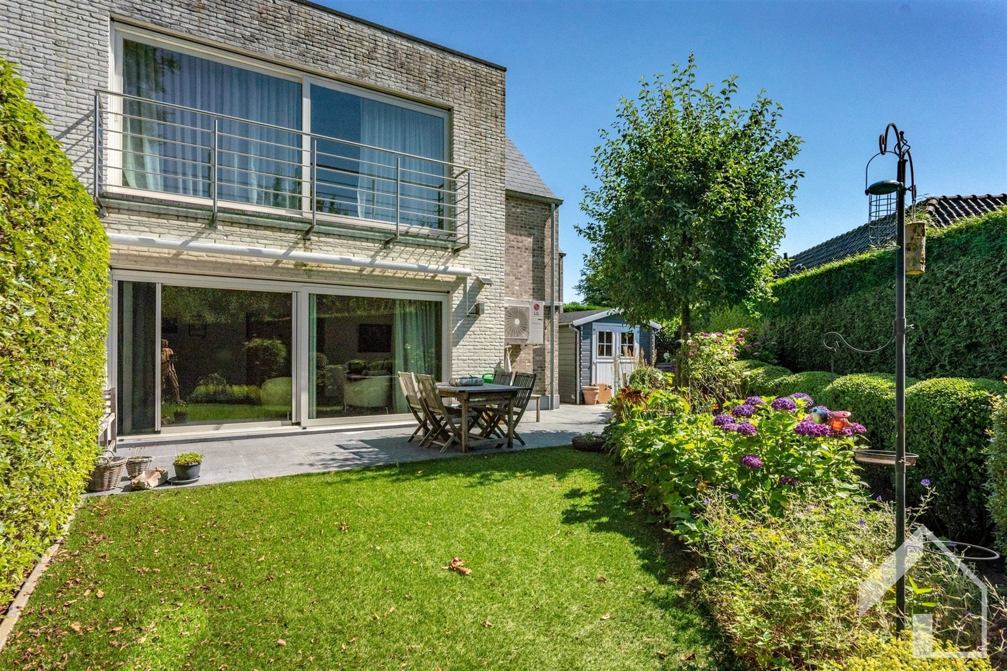 Energiezuinige woning met lift, tuin, oprit en inpandige garage foto 25