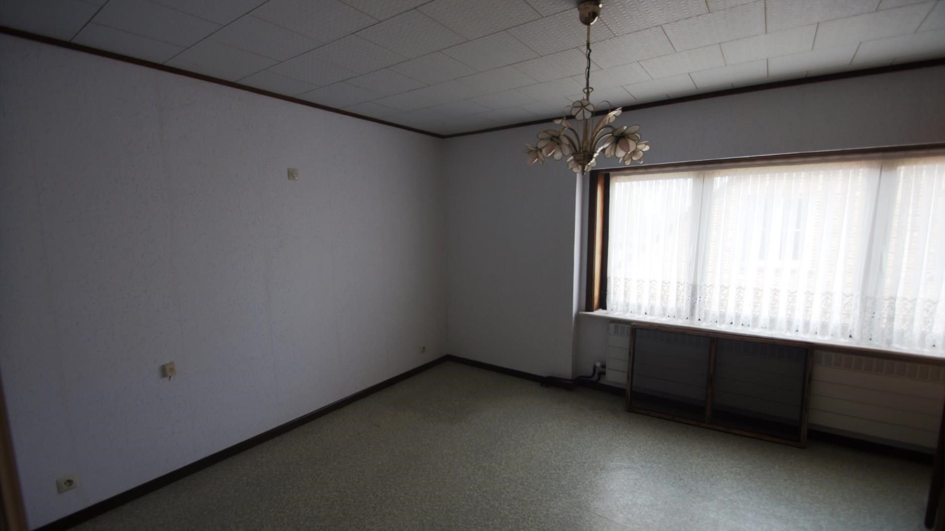 Ruime woning met 2 slpks en mooie tuin foto 8