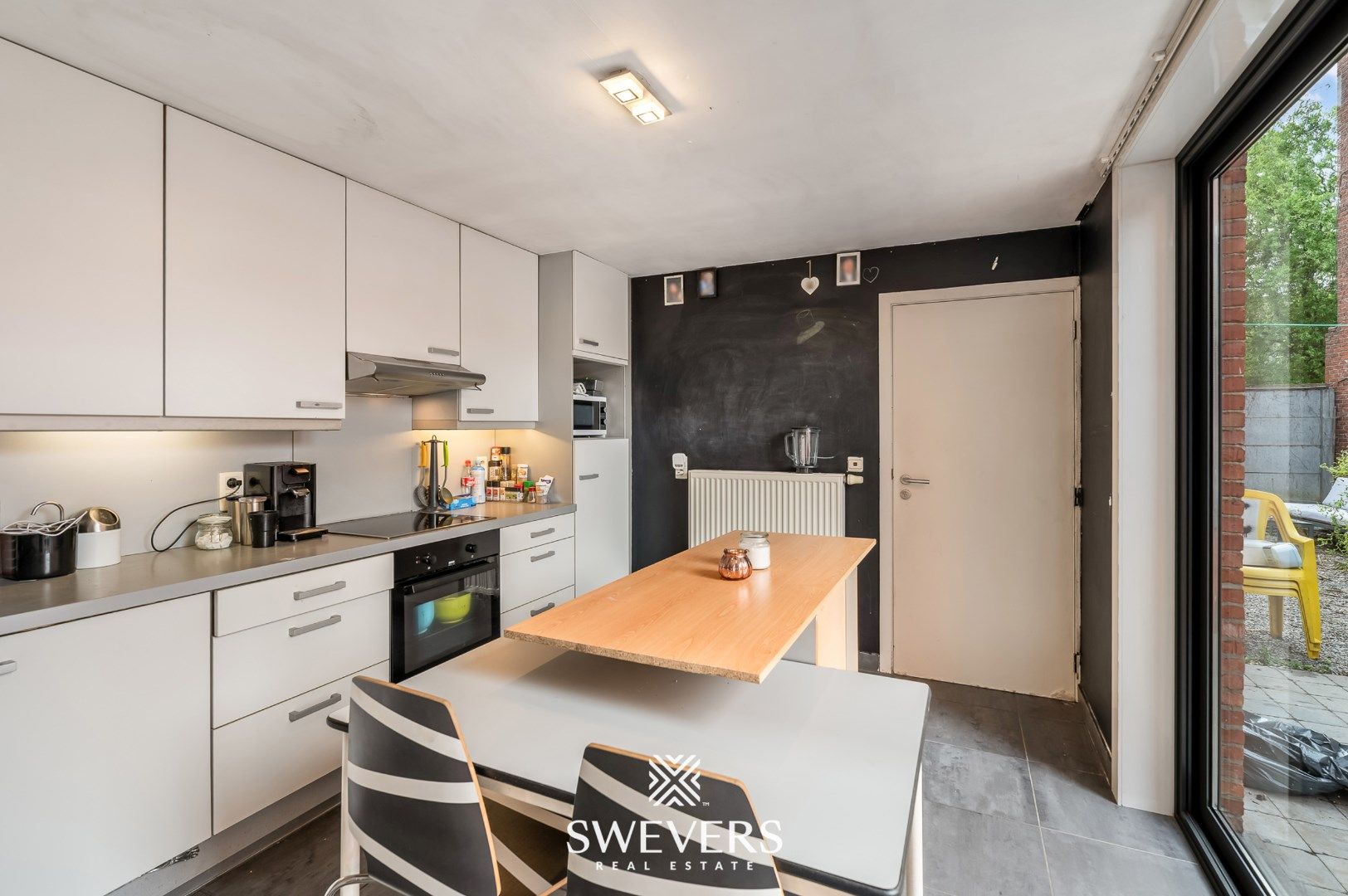 Te renoveren woning in hartje Beringen foto 8
