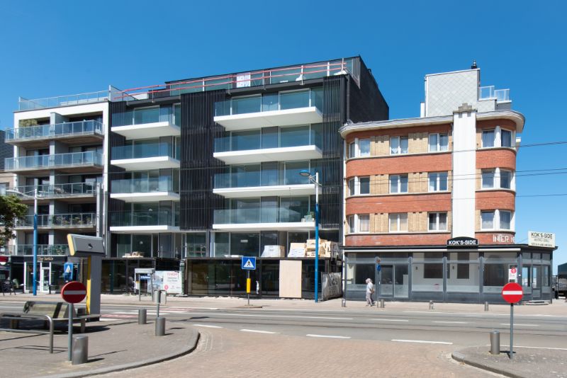 Modern nieuwbouwappartement in het centrum van Koksijde-Bad foto {{pictureIndex}}