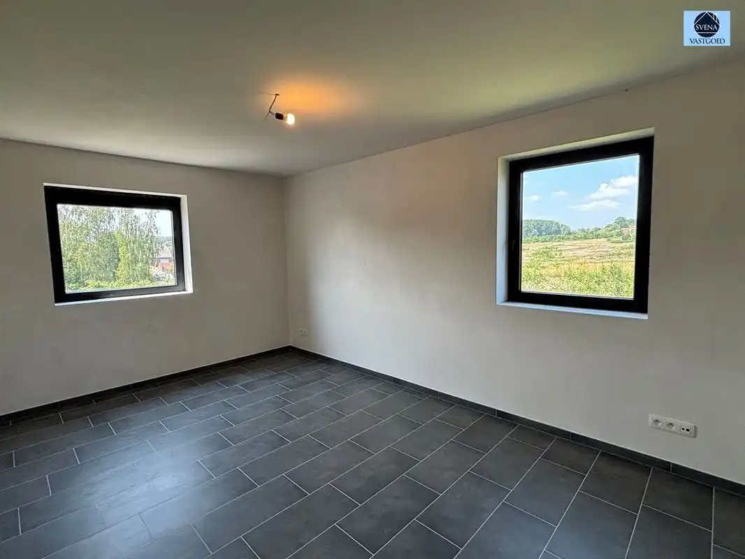 INSTAPKLARE BEN-WONING MET KELDER, GARAGE EN ZONNIGE TUIN IN ASPELARE foto 10