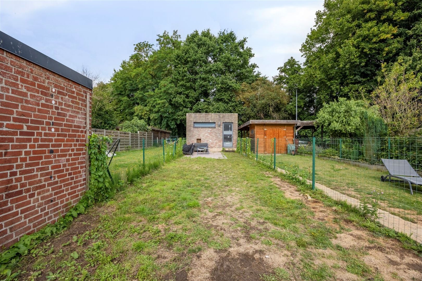 Ruime rijwoning met garage foto 24