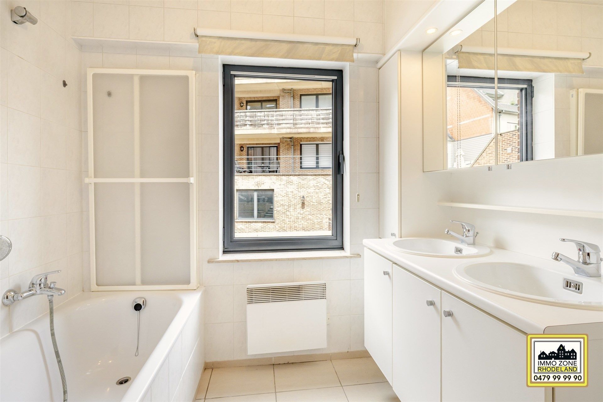 Centraal gelegen appartement met 2 slpks en gem. terras foto 14