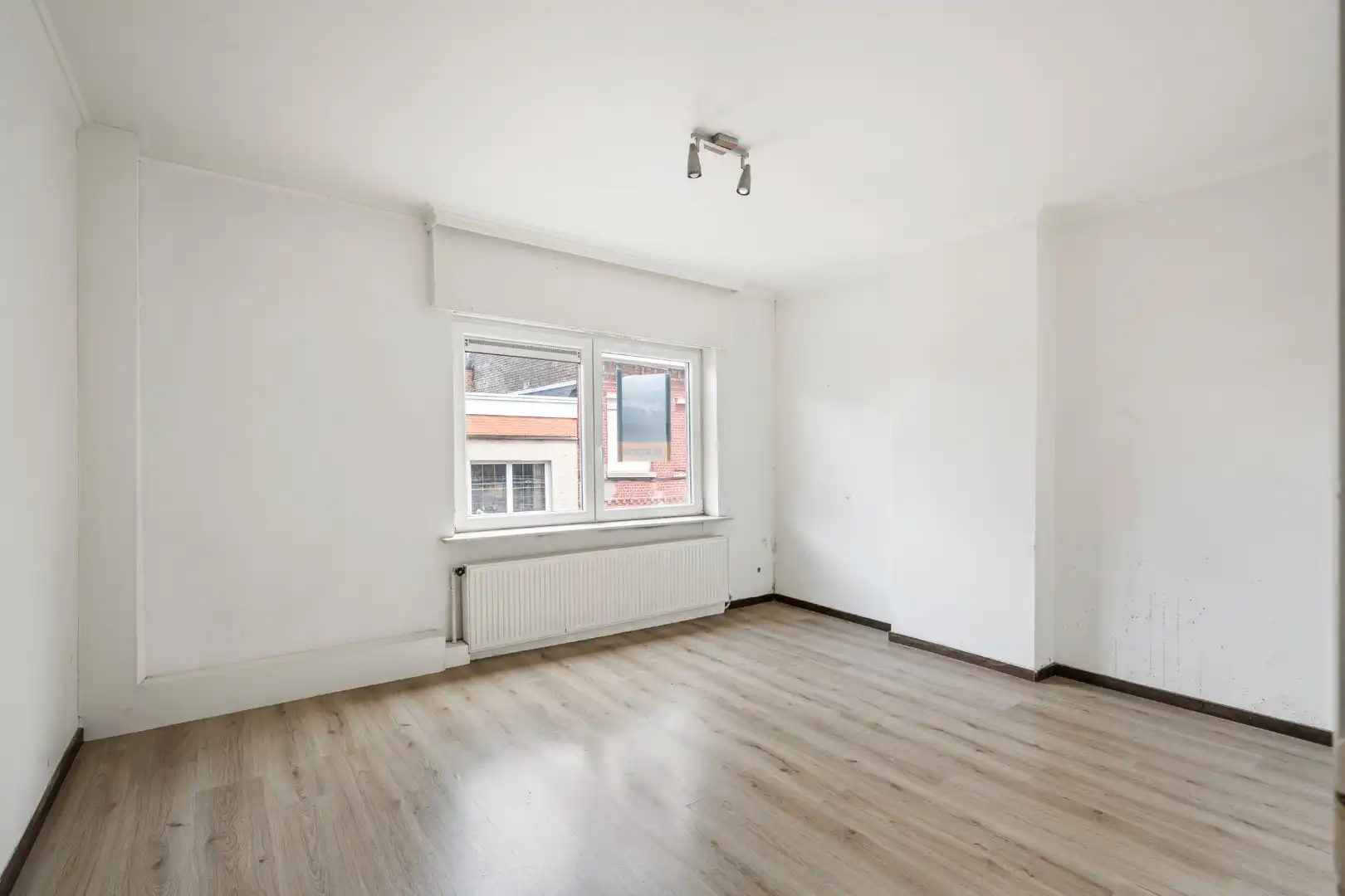 Instapklare woning met 3 slaapkamers in het centrum van Menen foto 8