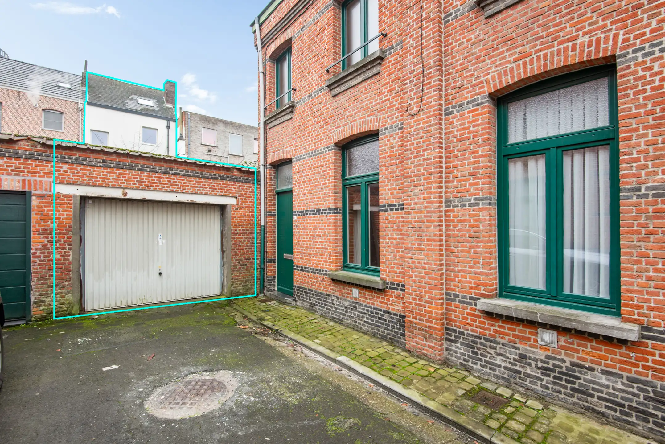 In het centrum gel. stadswoning met 5 slpk., terras, tuin en garage foto 10