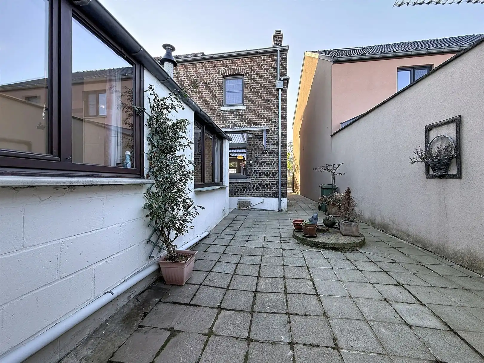 Op te frissen woning met binnenkoer, tuin, 3 slpks foto 4
