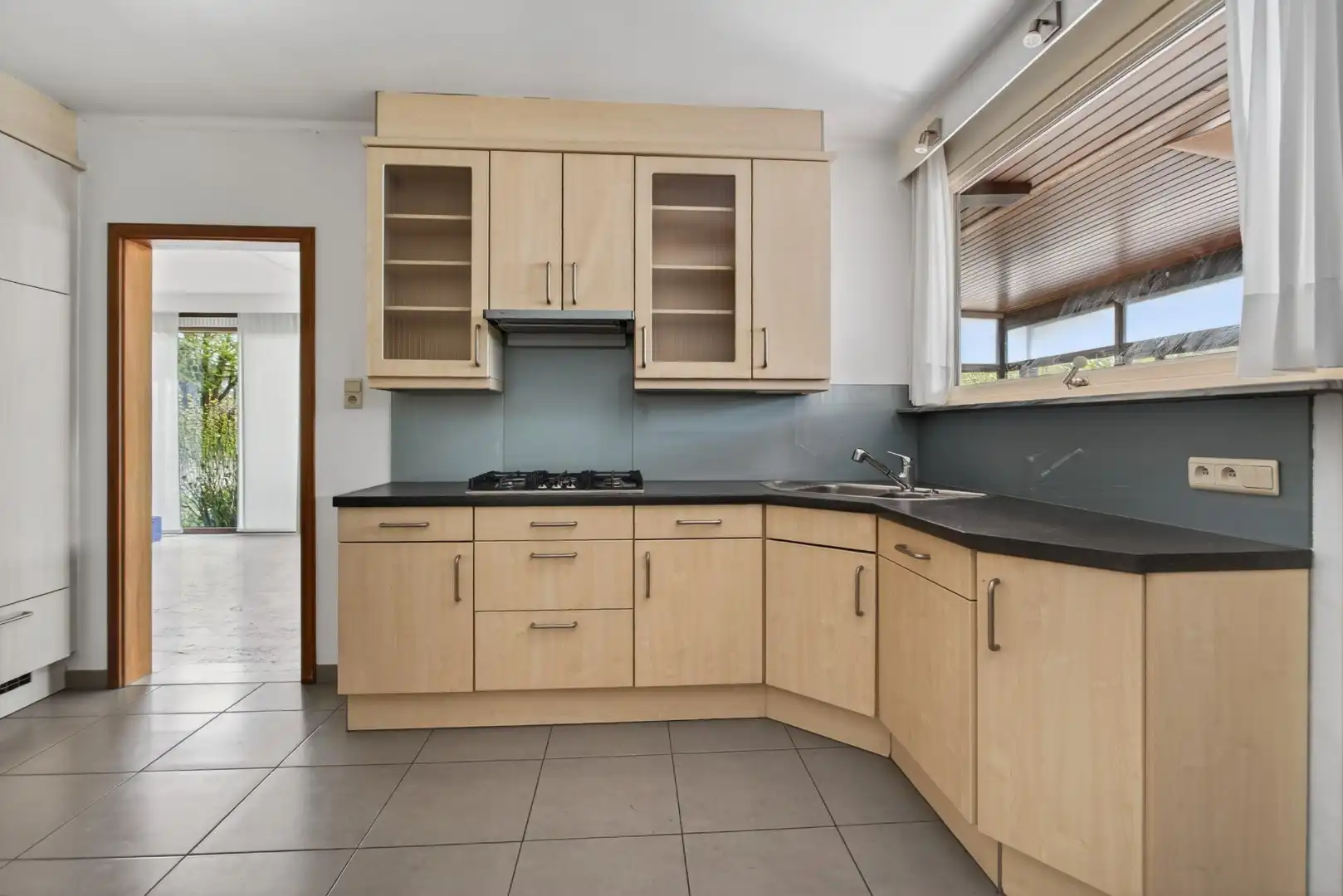 Ruime gelijkvloerse woning met veel potentieel op rustige ligging in Mol foto 19