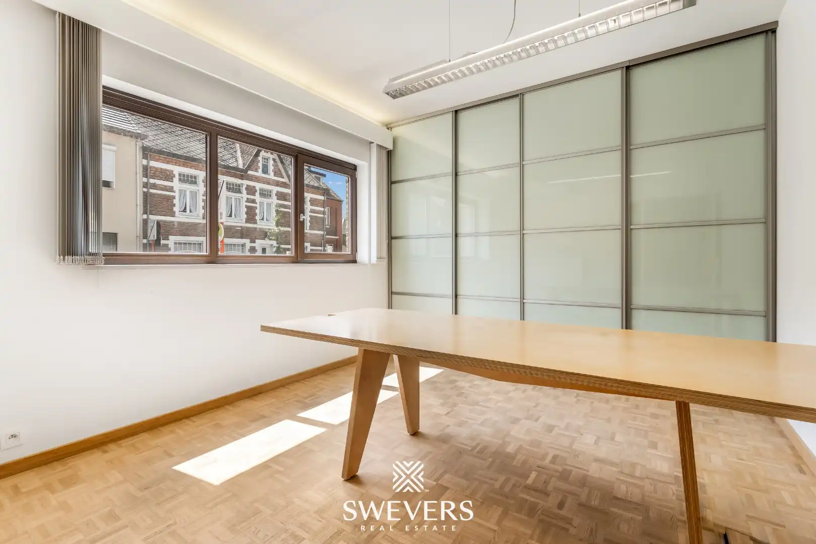 Veelzijdig handelspand op toplocatie in het centrum van Beringen foto 15