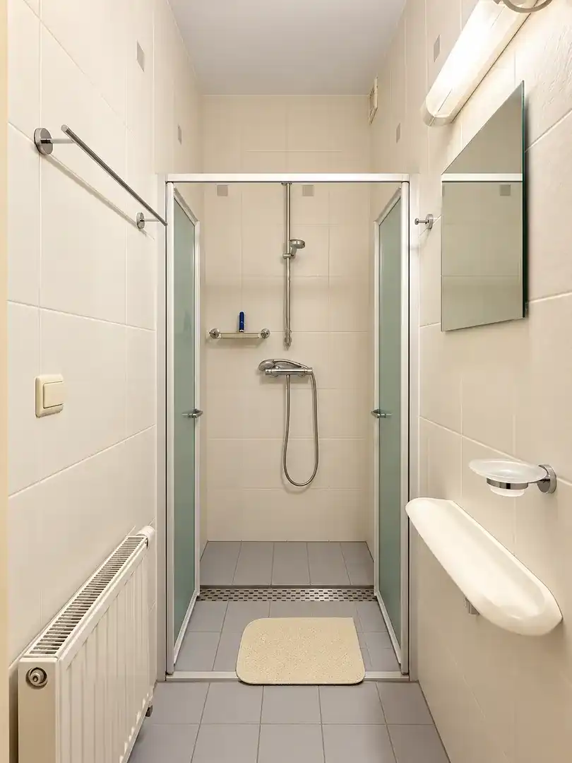 Riant en instapklaar appartement met tuin en 2 slaapkamers in centrum Herent foto 16