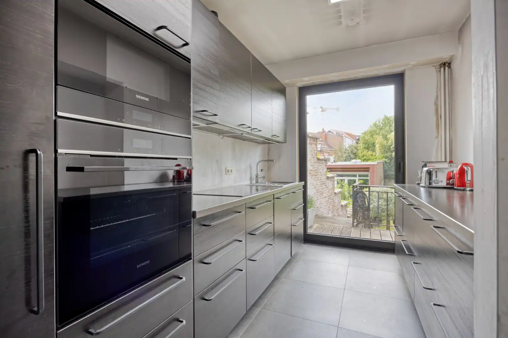 Prachtig herenhuis op de Tiensevest met mogelijkheid tot praktijkruimte - bewoonbare opp. 555 m²  foto 13