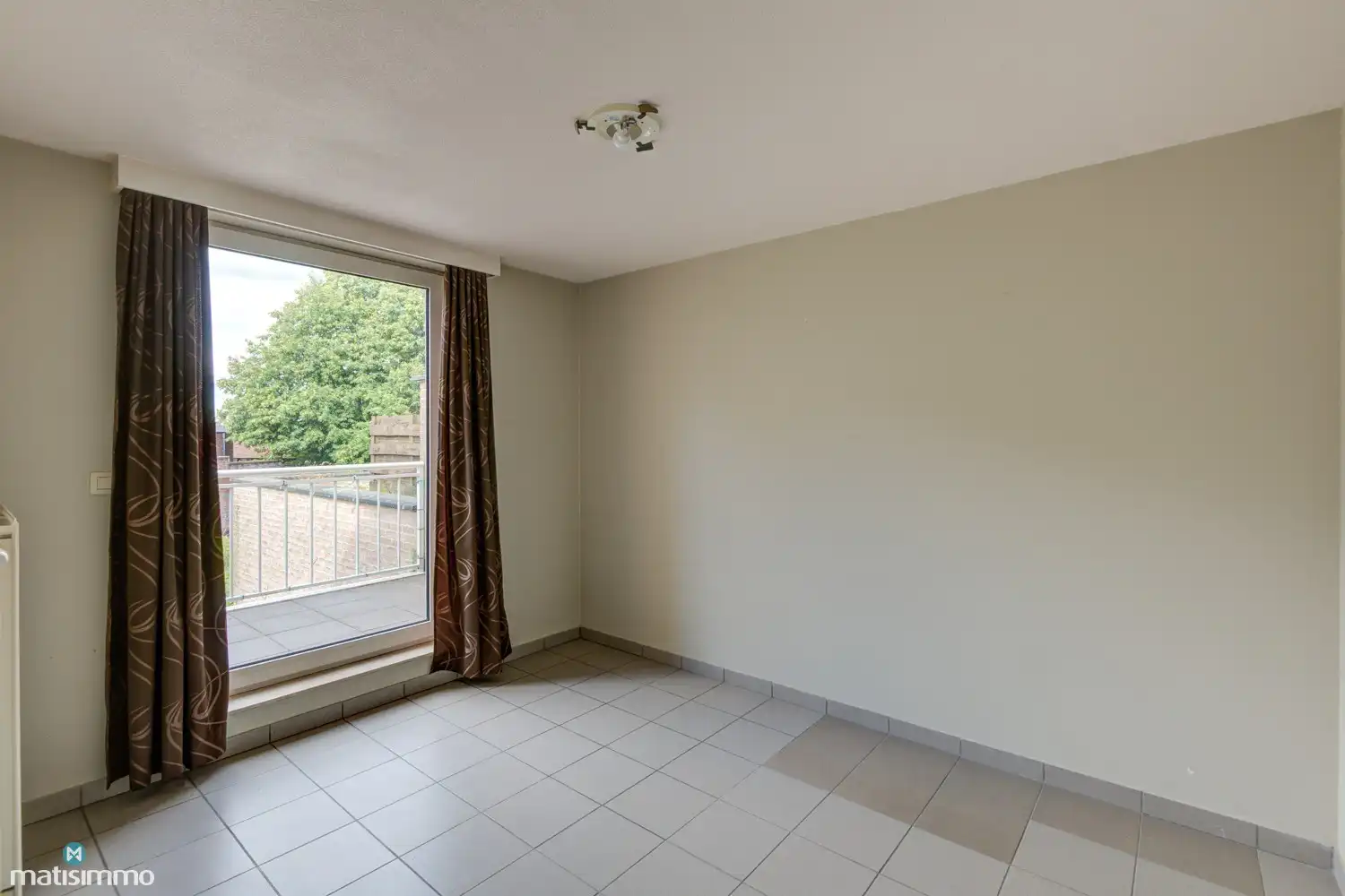 APPARTEMENT MET TWEE SLAAPKAMERS EN GARAGE IN HET CENTRUM VAN HOESELT foto 11