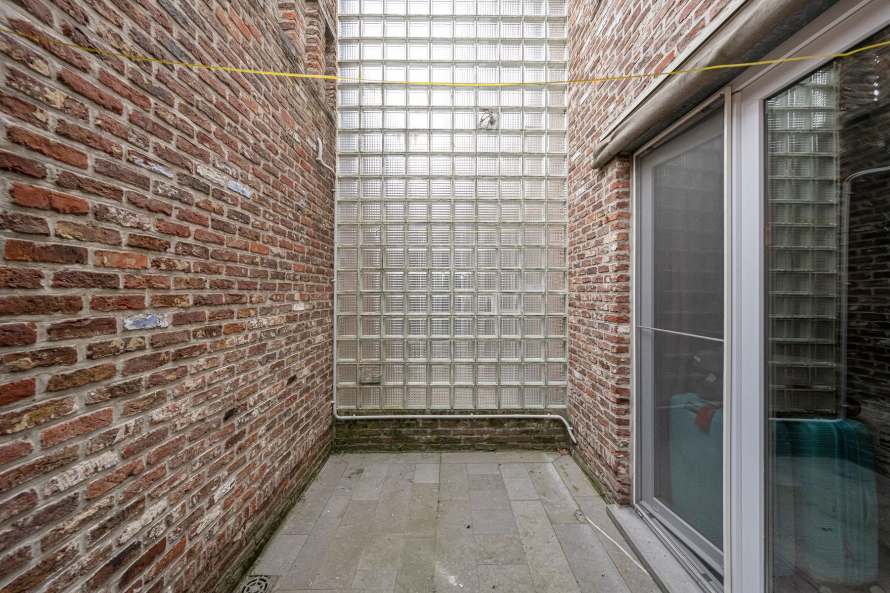Gelijkvloers appartement met zonnig terras en aparte garage! foto 9