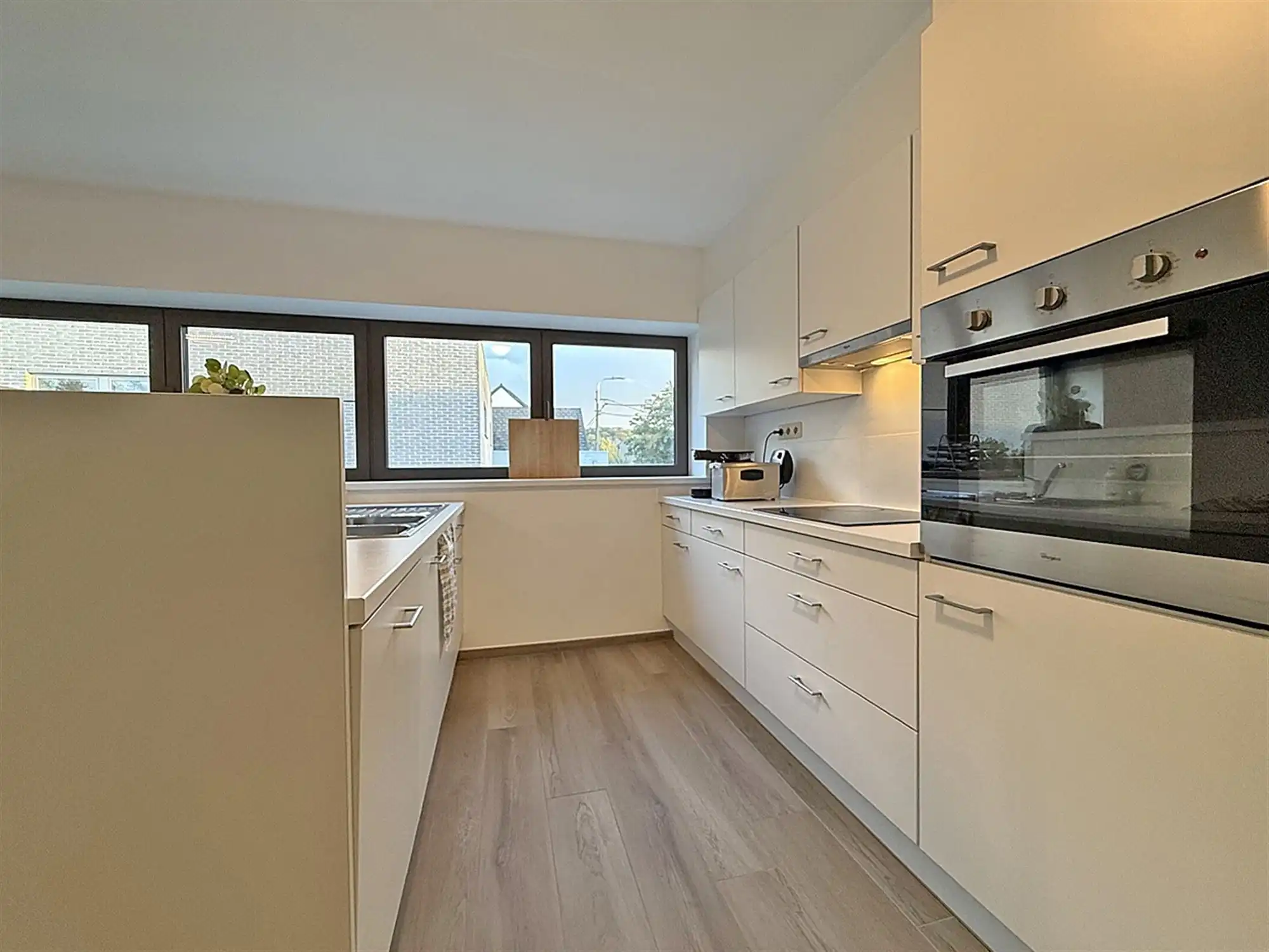 Recent, instapkl. APPARTEMENT met 2 slpks, terras & ruime garage foto 5