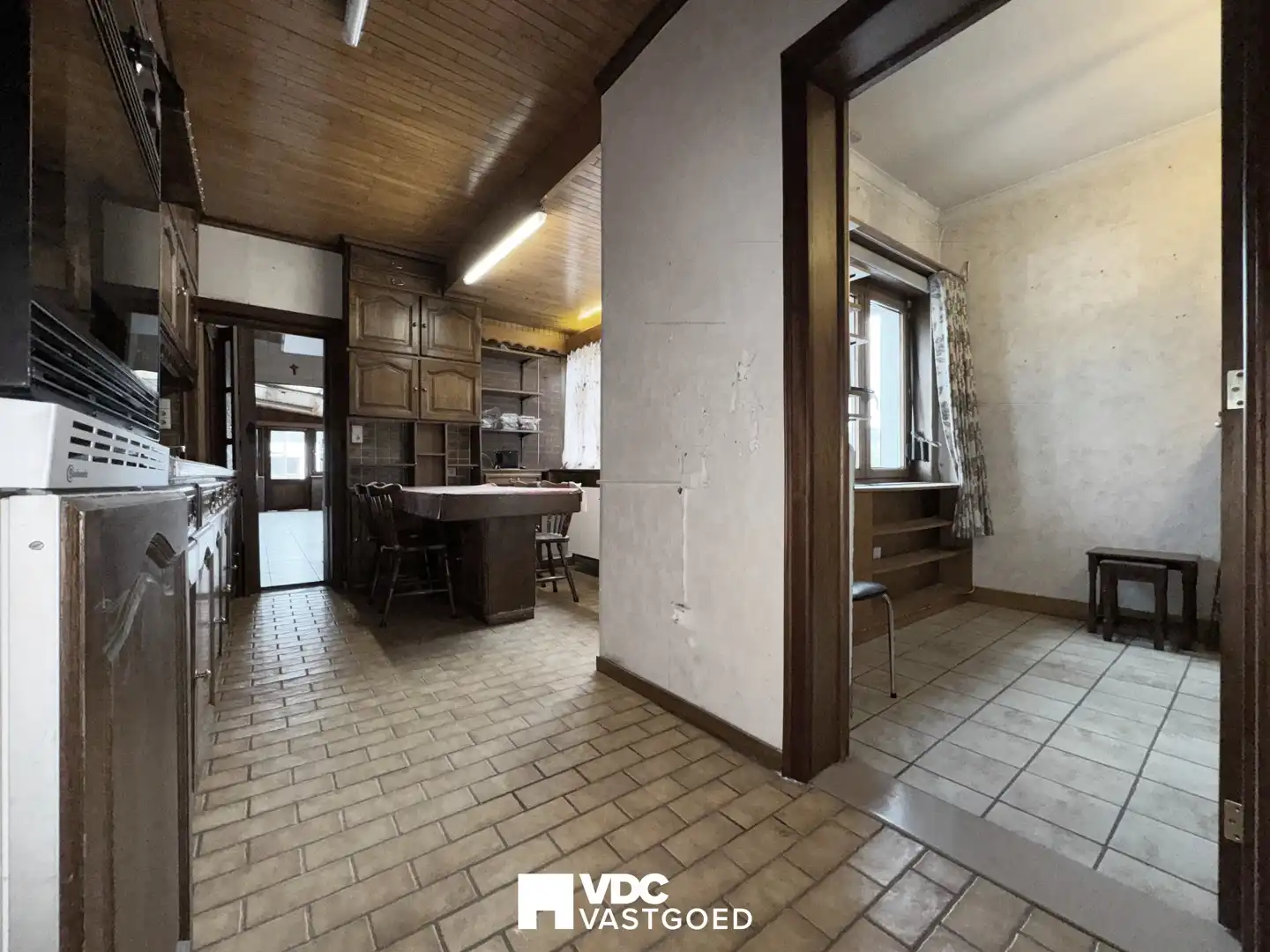 Te renoveren woning met werkplaats, garage en veel potentieel foto 8
