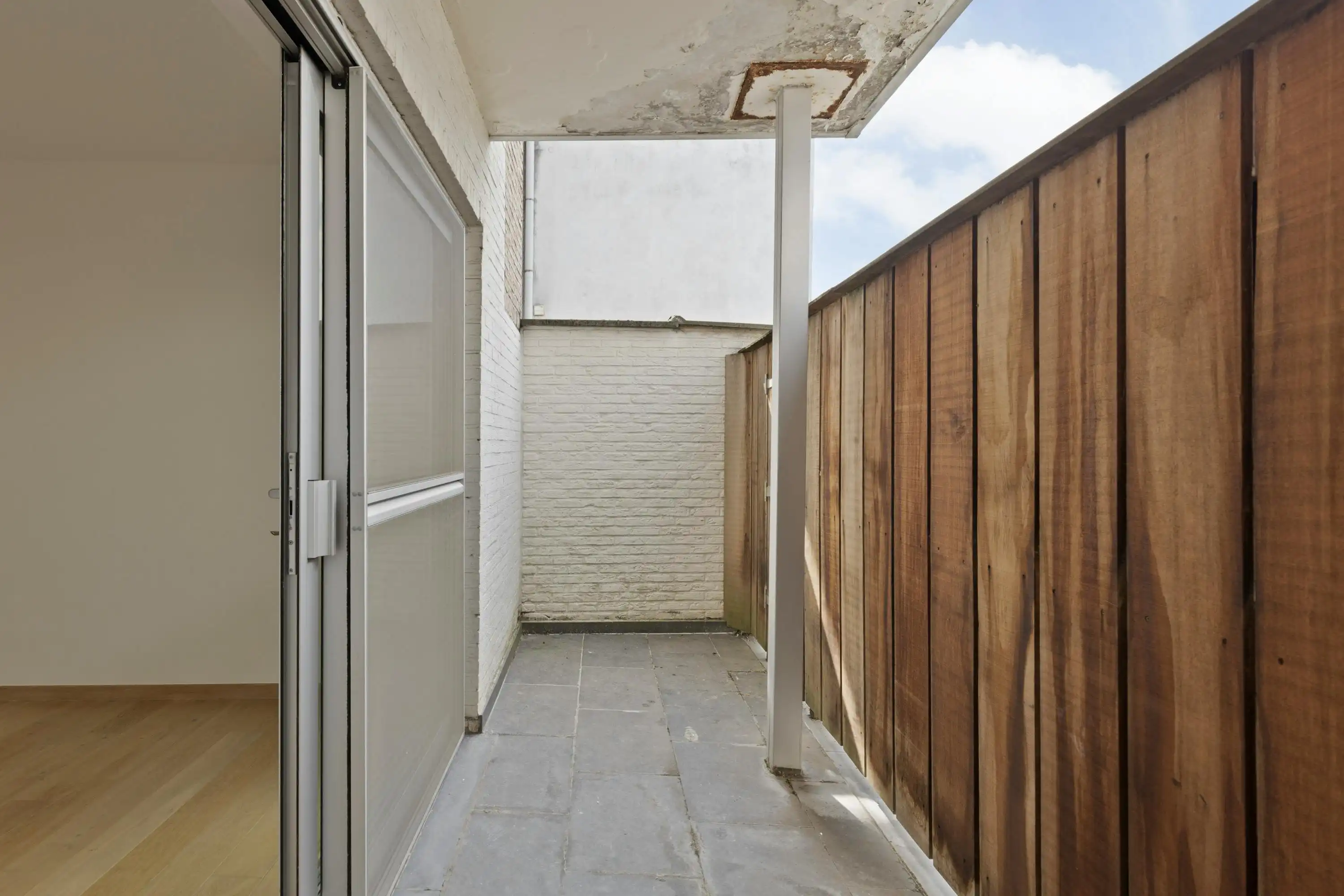 Ruim appartement met groot terras tegenover het Begijnhof foto 11