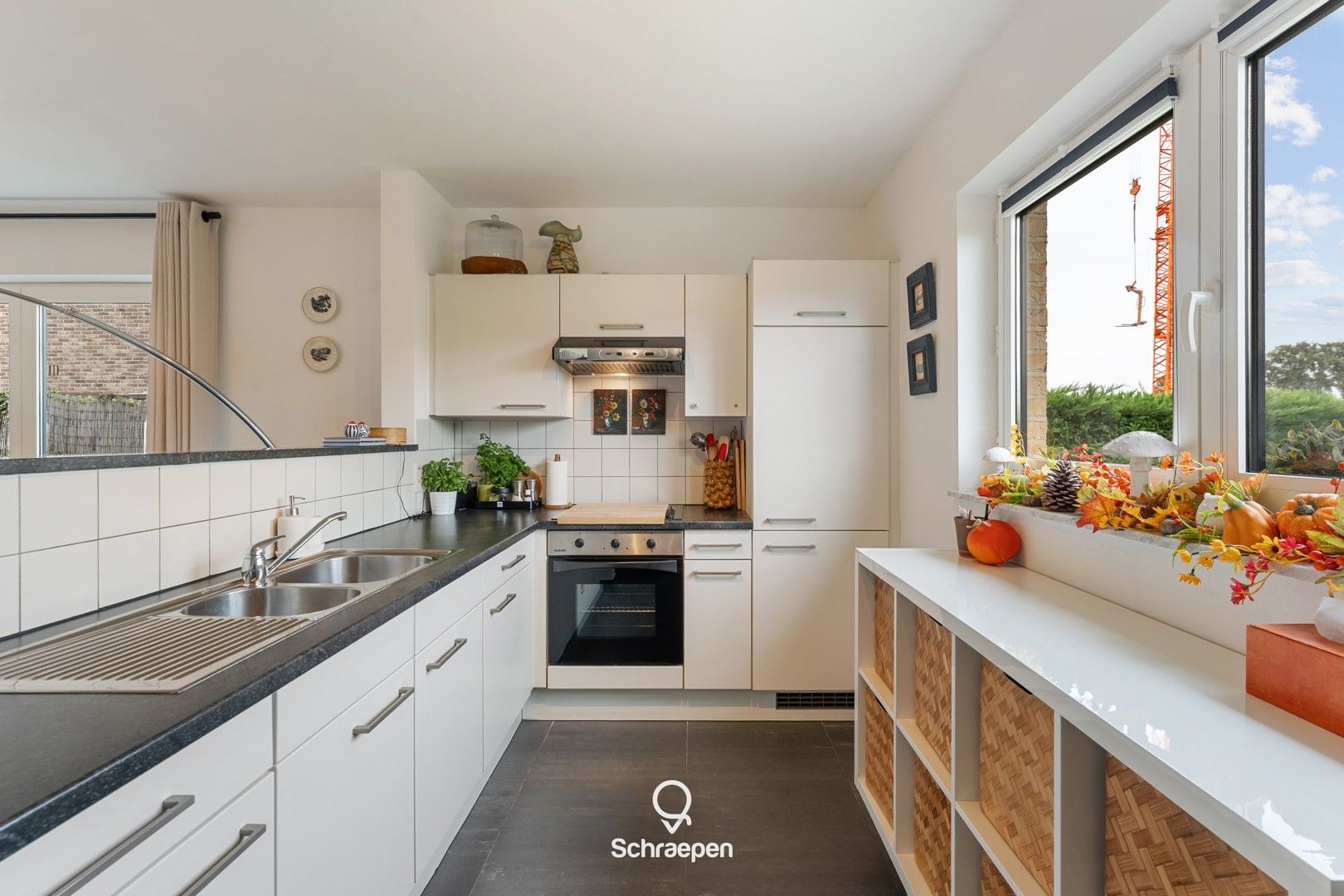 Gelijkvloers appartement met 2 slpks, onderhoudsvriendelijke tuin en garage te Zonhoven-centrum! foto 10