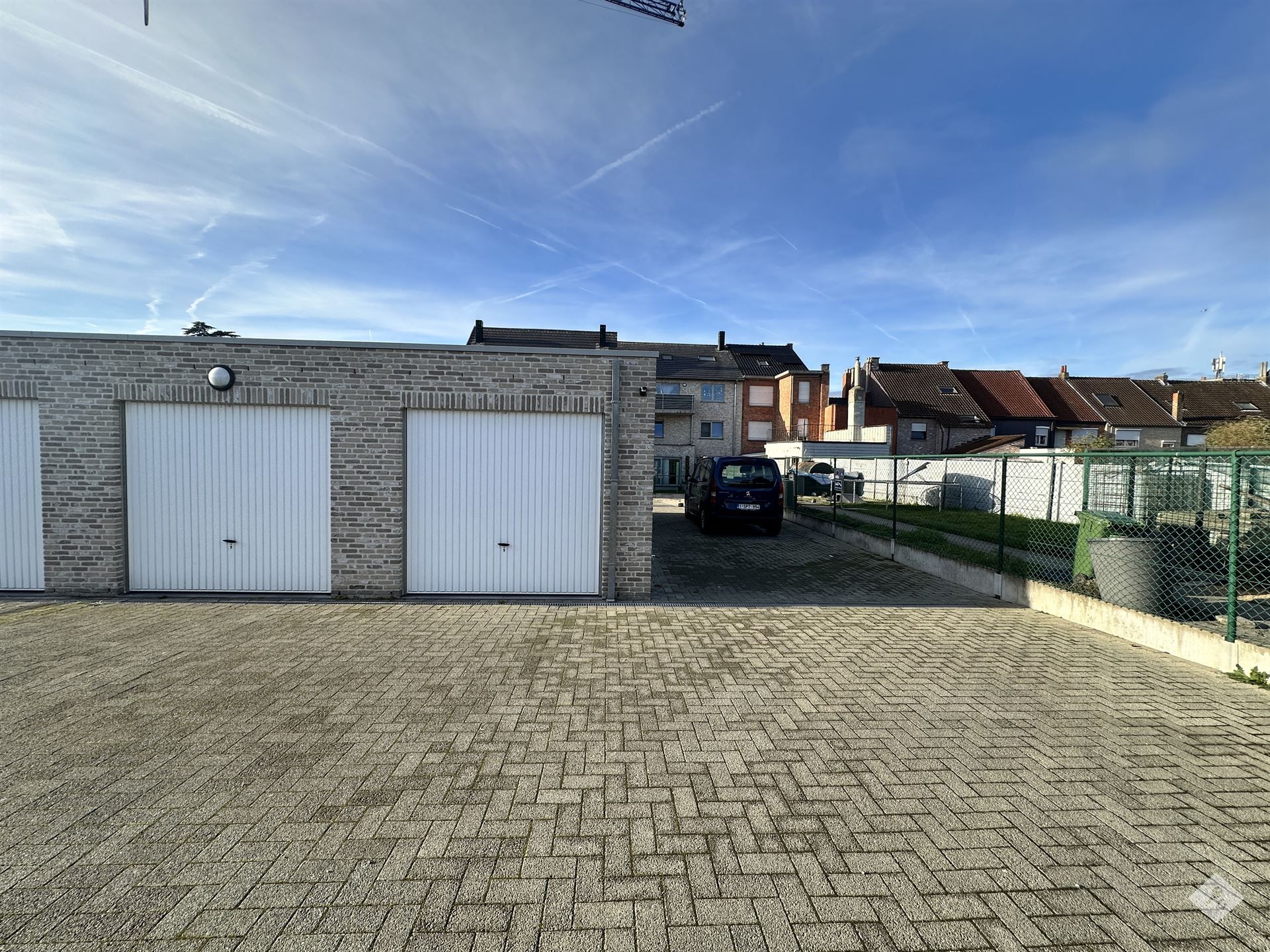 Ruim appartement met tuin, garage en buitenberging foto 16