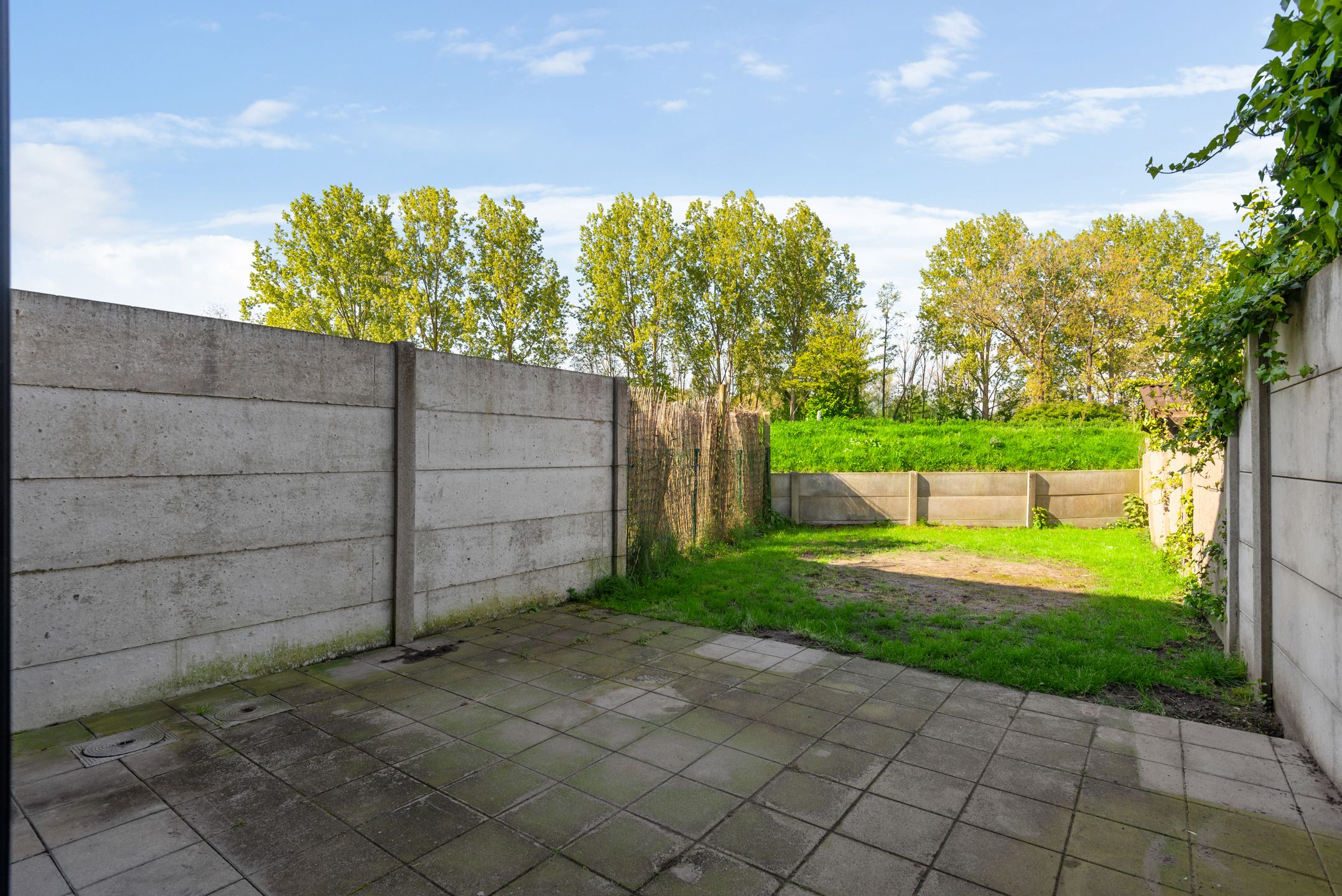 Rijwoning met tuin foto 18