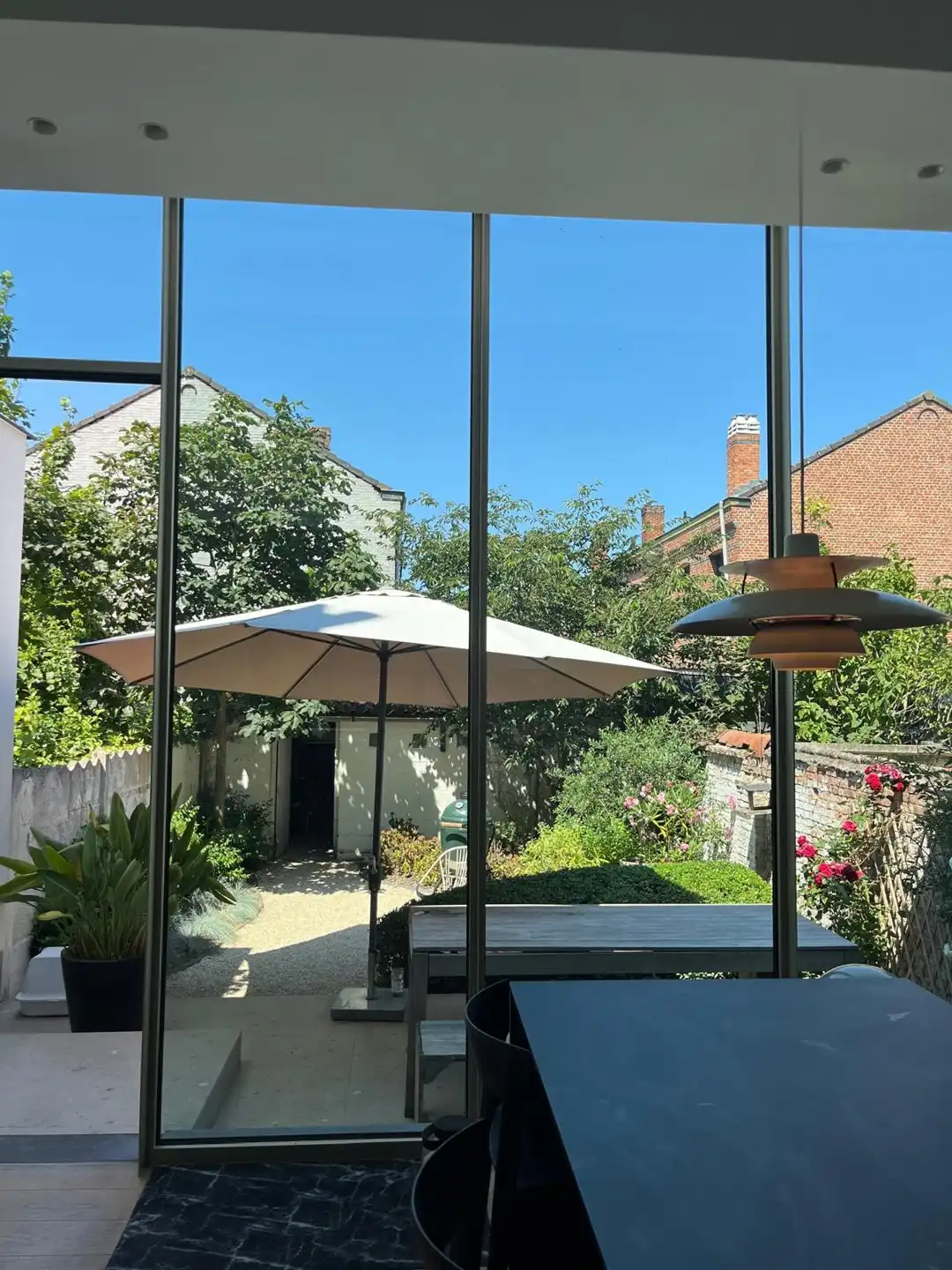 In het centrum gel. stadswoning met 5 slpk., terras, tuin en garage foto 37