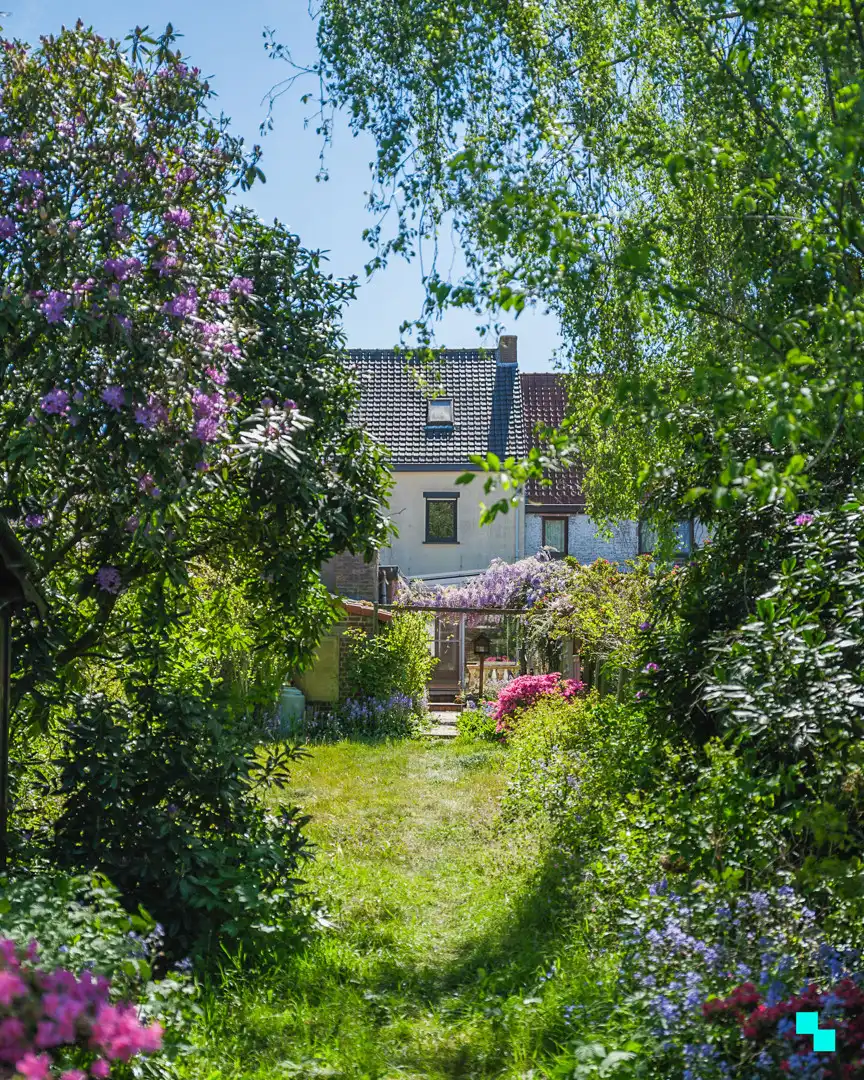 Te renoveren woning met gezellige tuin in het hart van Merelbeke foto 31