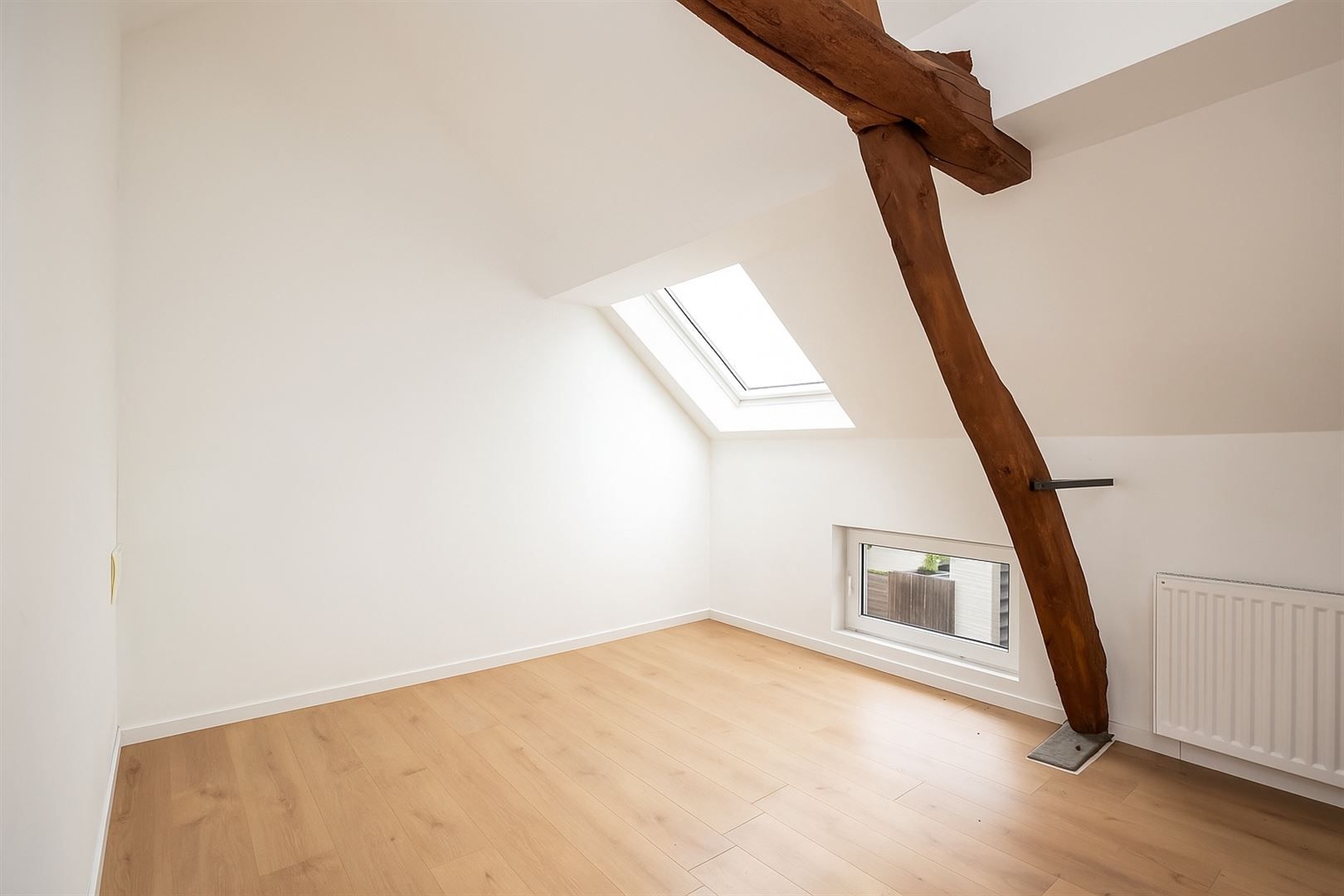 Fijn , recente  gerenoveerde starterswoning met  2 slaapkamers in doodlopend straatje. foto 12