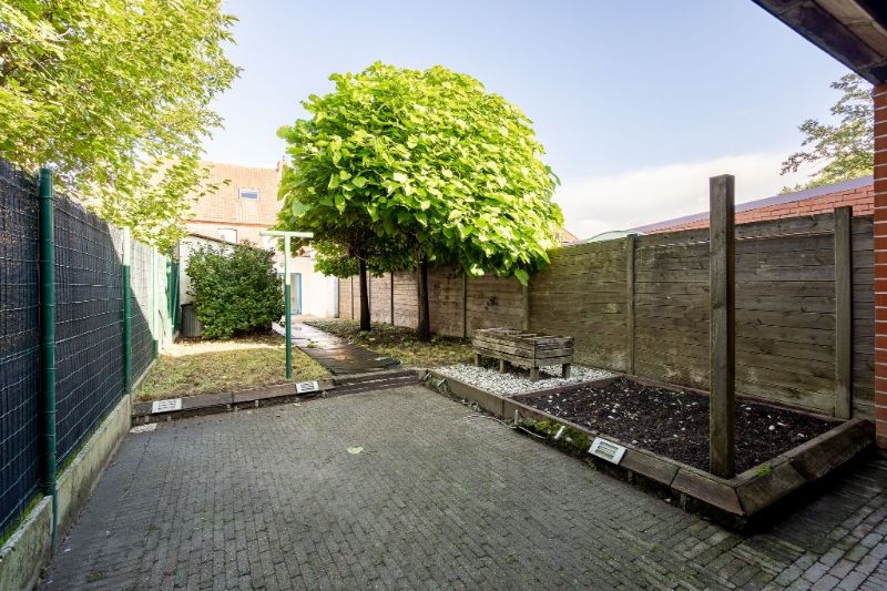 Instapklare woning met ruime keuken, tuin en garage op centrale locatie foto 31