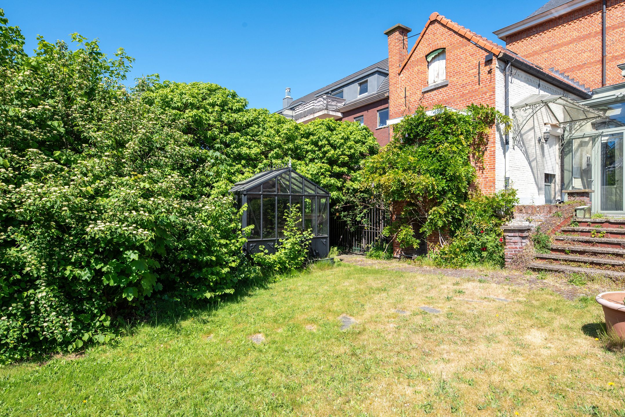 Uniek en imposant halfopen herenhuis met zuidtuin foto 28