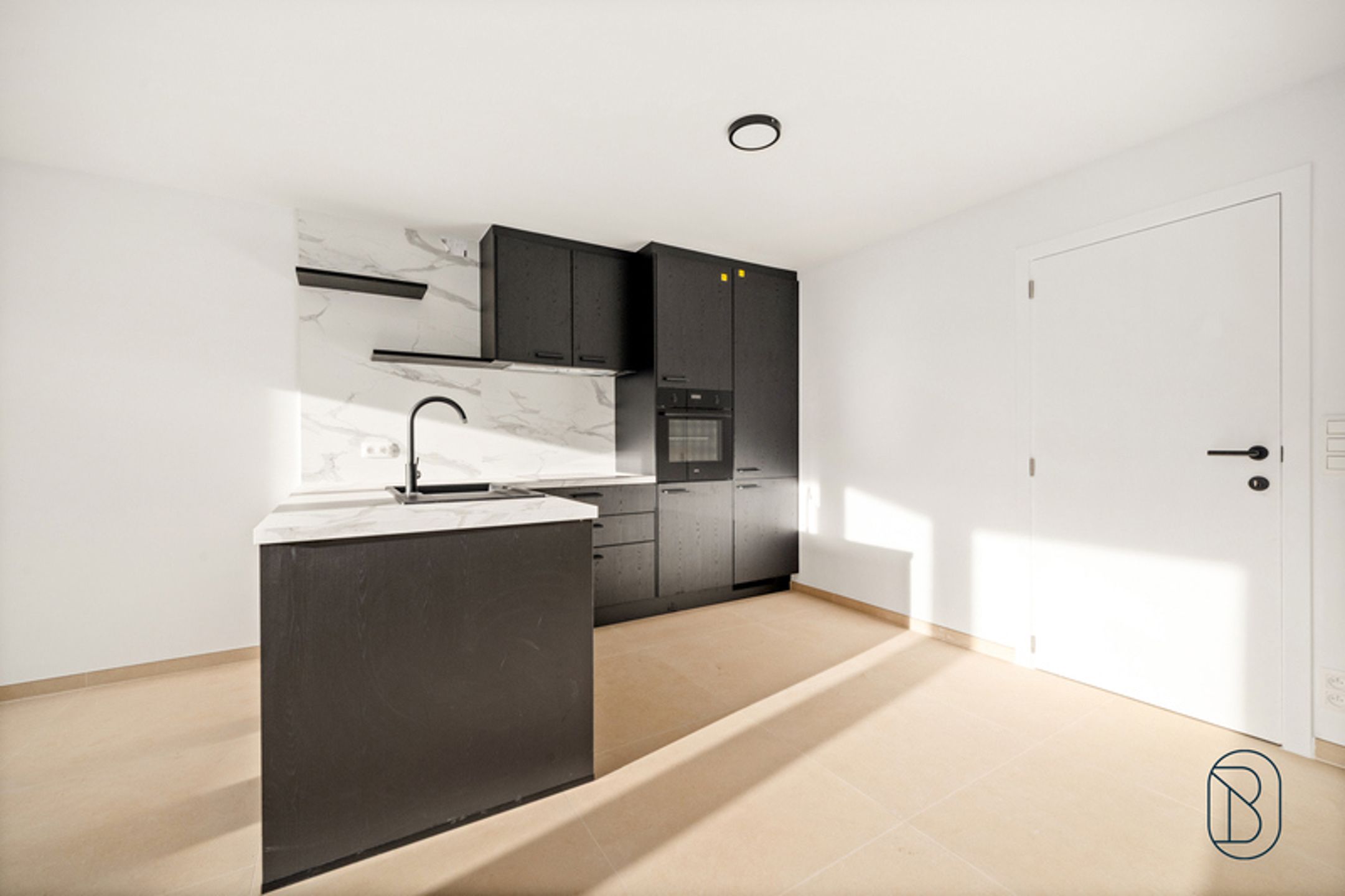 Gerenoveerd en instapklaar gelijkvloers appartement met tuin foto 5