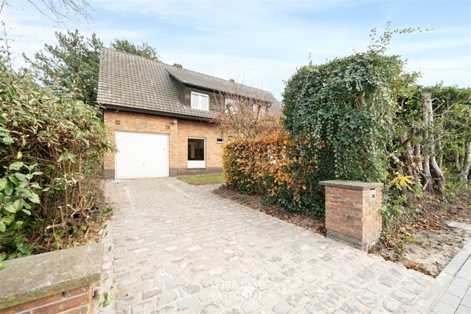 Ruime villawoning met 4+1 slaapkamers en fijne tuin, te renoveren foto 21