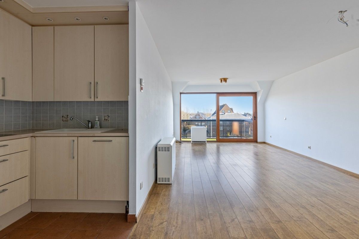 Ruim appartement met drie slaapkamers, twee terrassen en parking te koop! foto 6