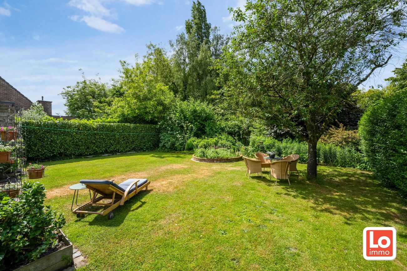VERKOCHT! Charmante open woning met carport en héél grote aangename tuin gelegen op een toplocatie vlakbij het centrum van Zaffelare! foto 31