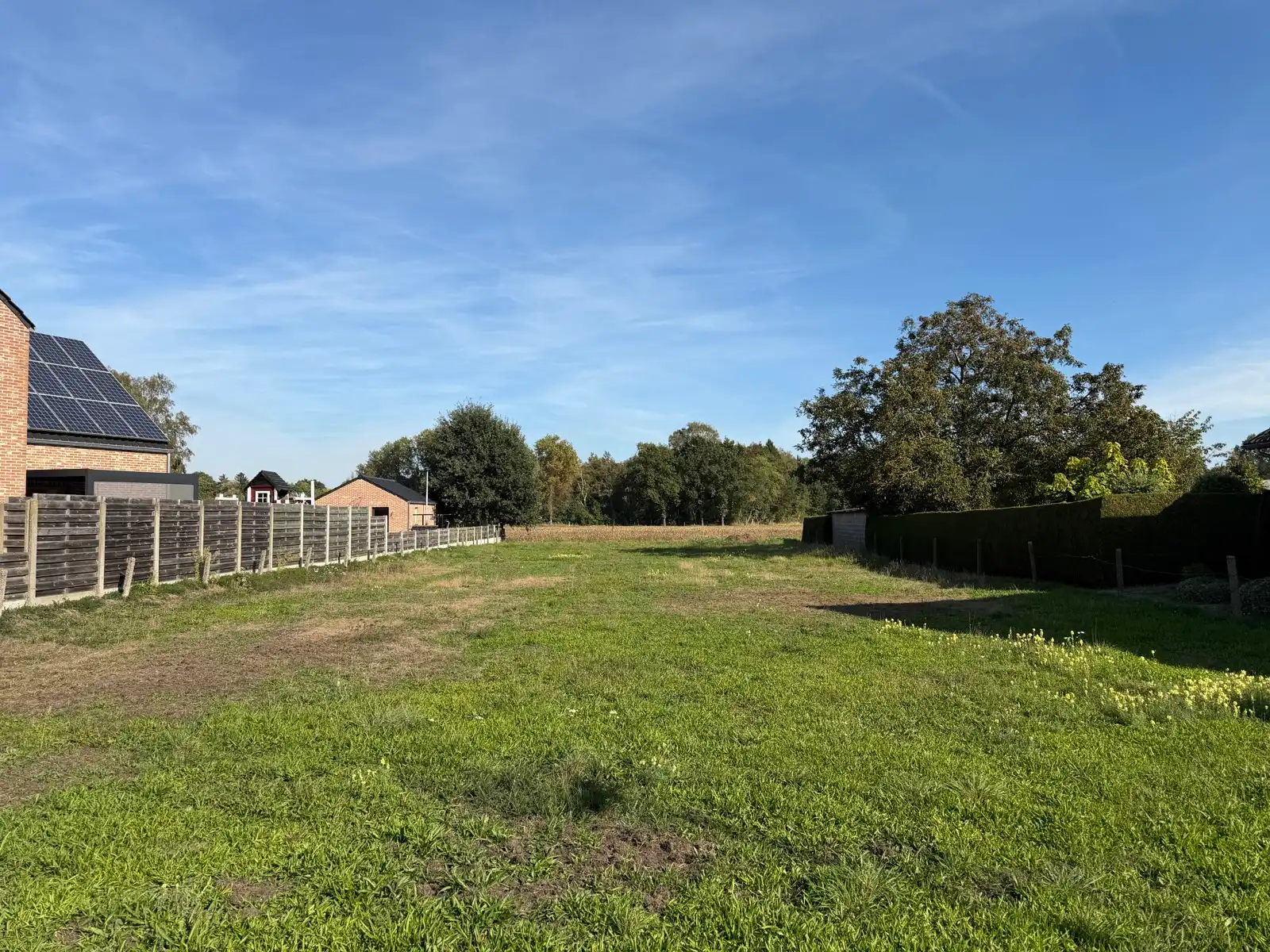 Bouwgrond van 1.154 m² met zicht op velden foto 2