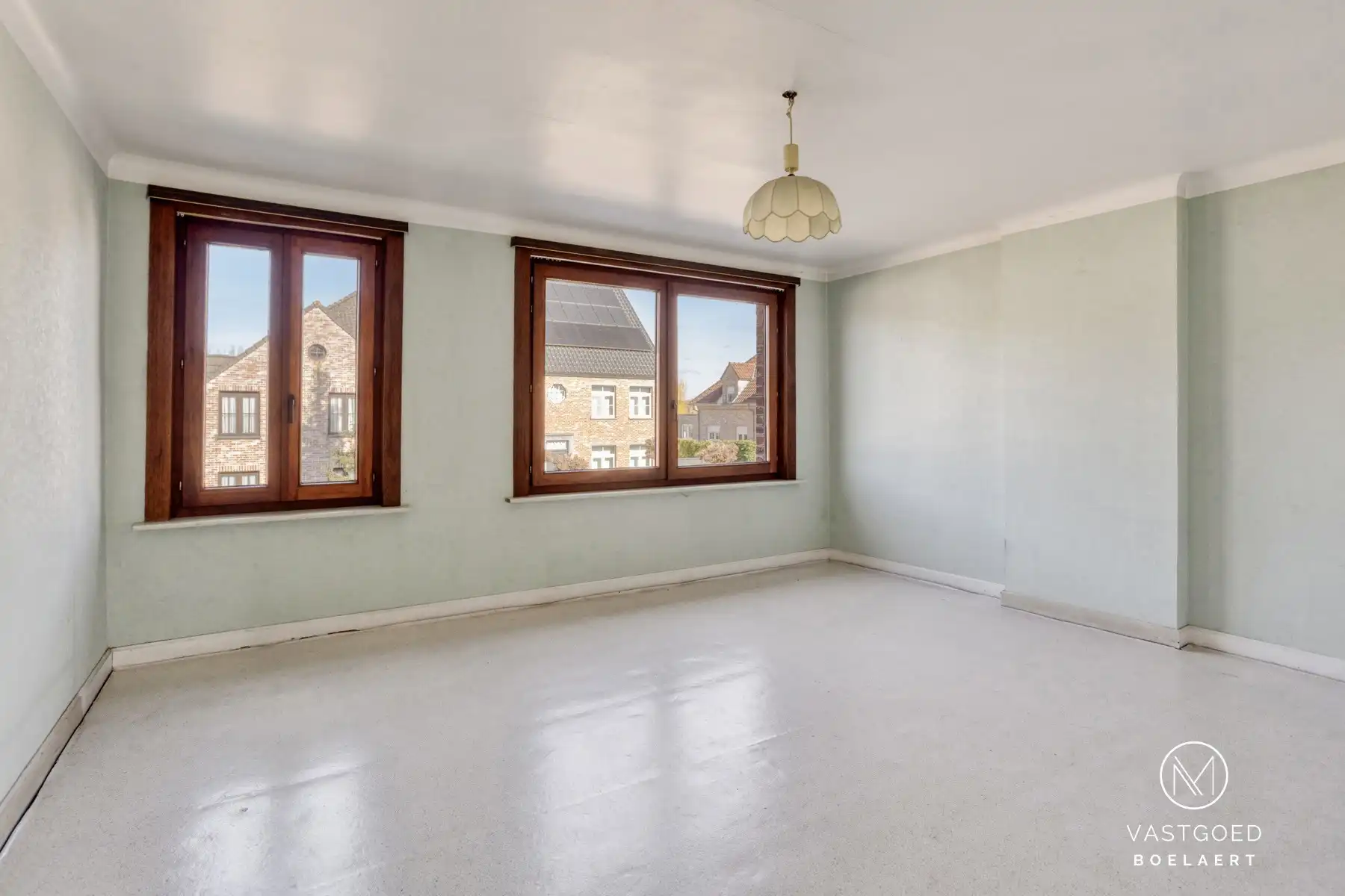 Te renoveren halfopen woning met zonnige tuin in rustige straat nabij Aalst foto 11